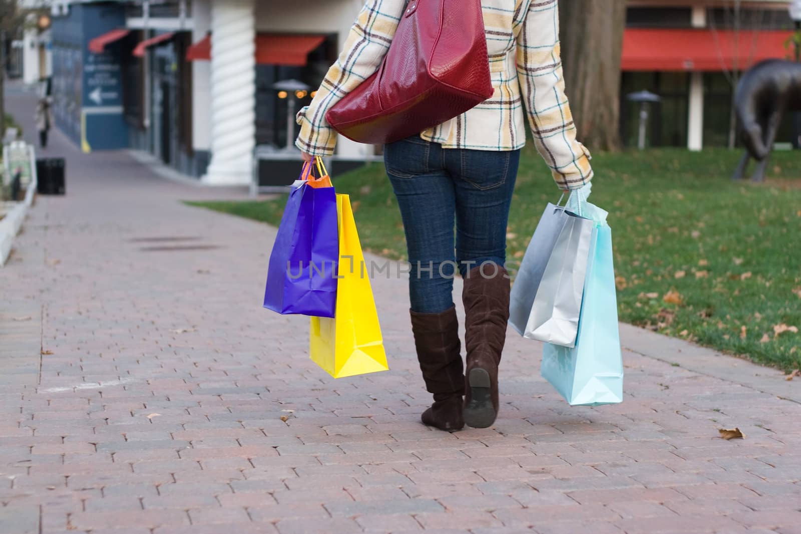 An attractive girl out shopping in the city.