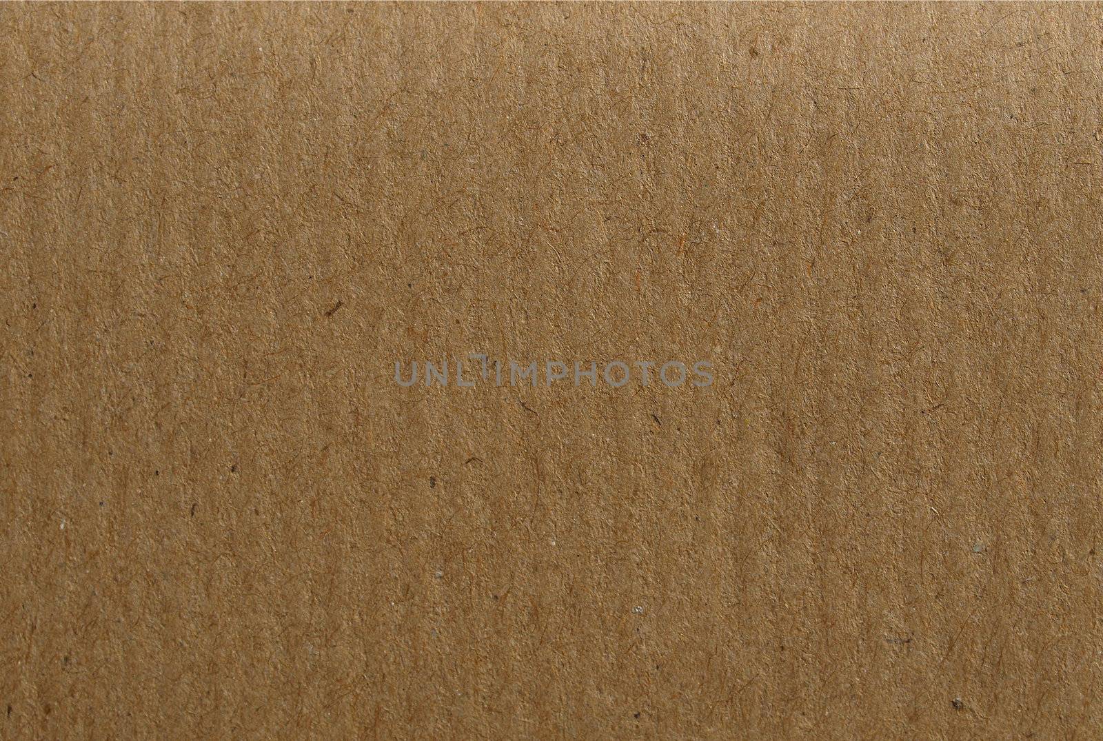 Blank sheet of brown paper useful as a background