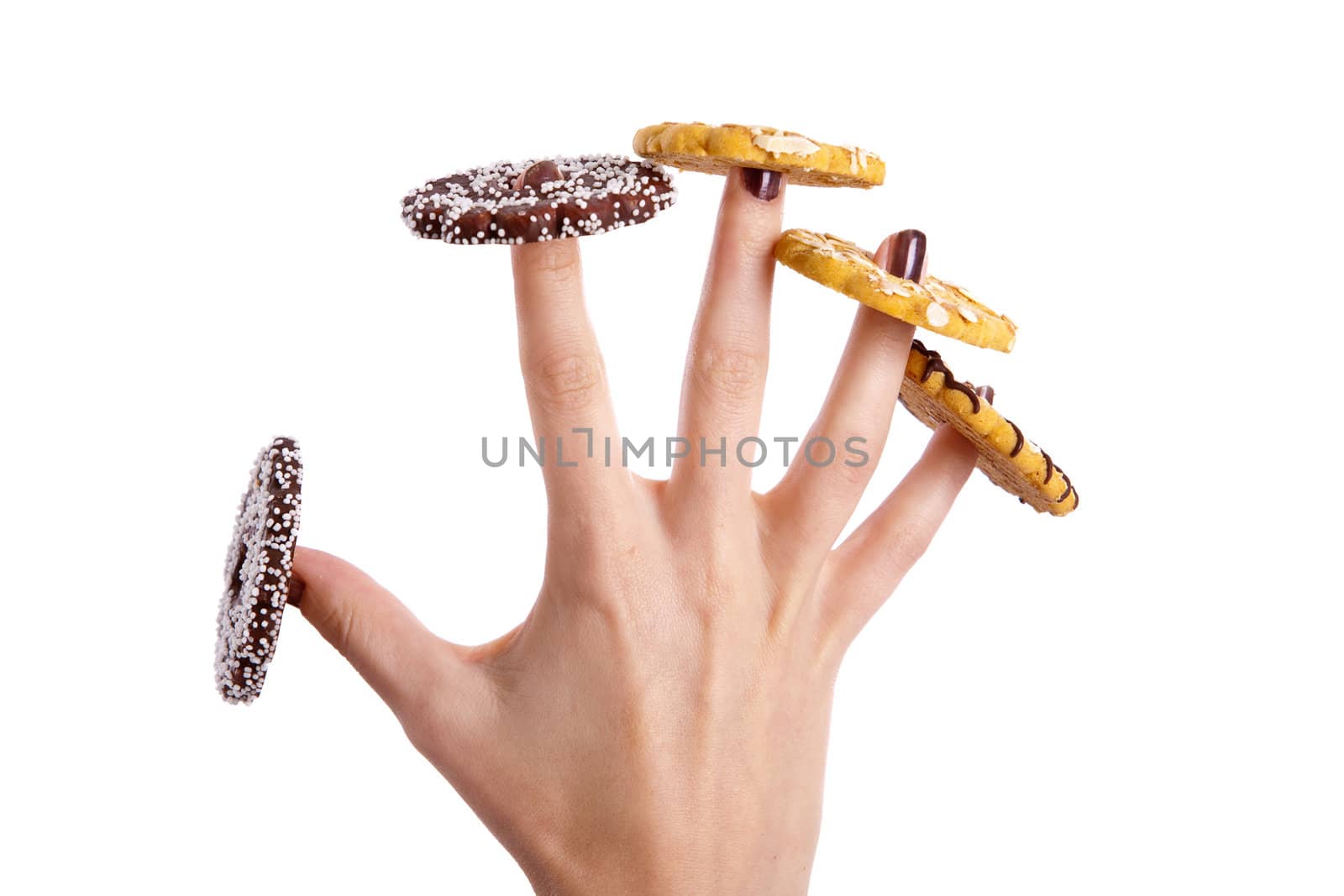 Woman hand with one cookie on each finger