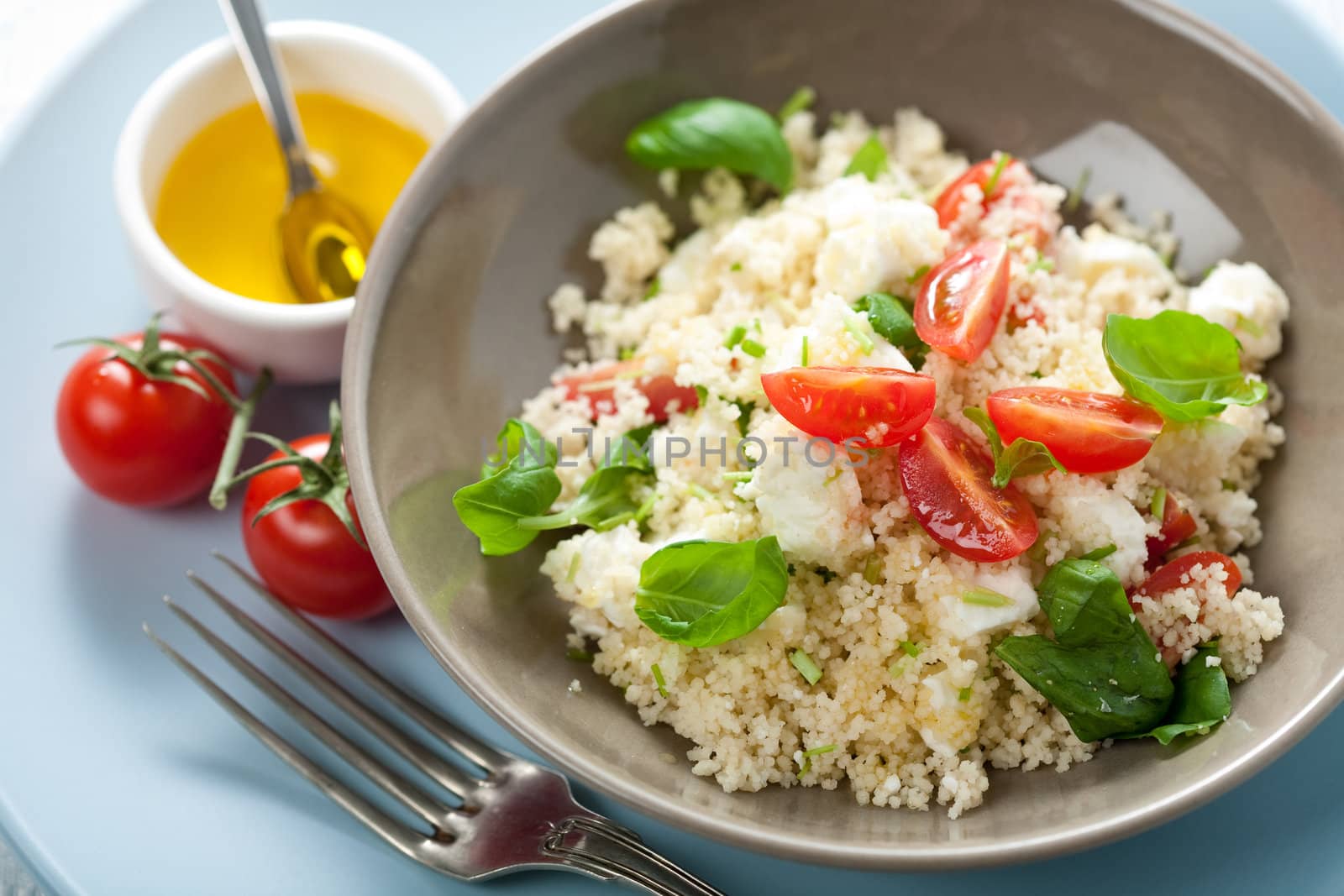 Delicious and healthy couscous salad with feta and tomatoes