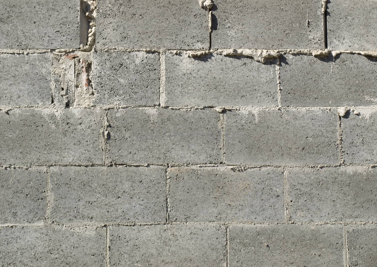 Old and grunge wall of concrete bricks