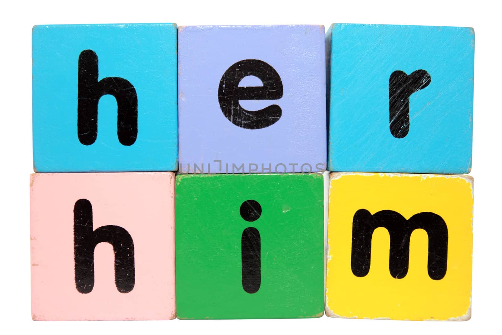 assorted childrens toy letter building blocks against a white background that spell her him with clipping path