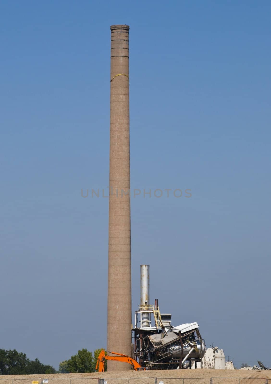 Old smoke stack, the only thing left as an old factory is demolished.
