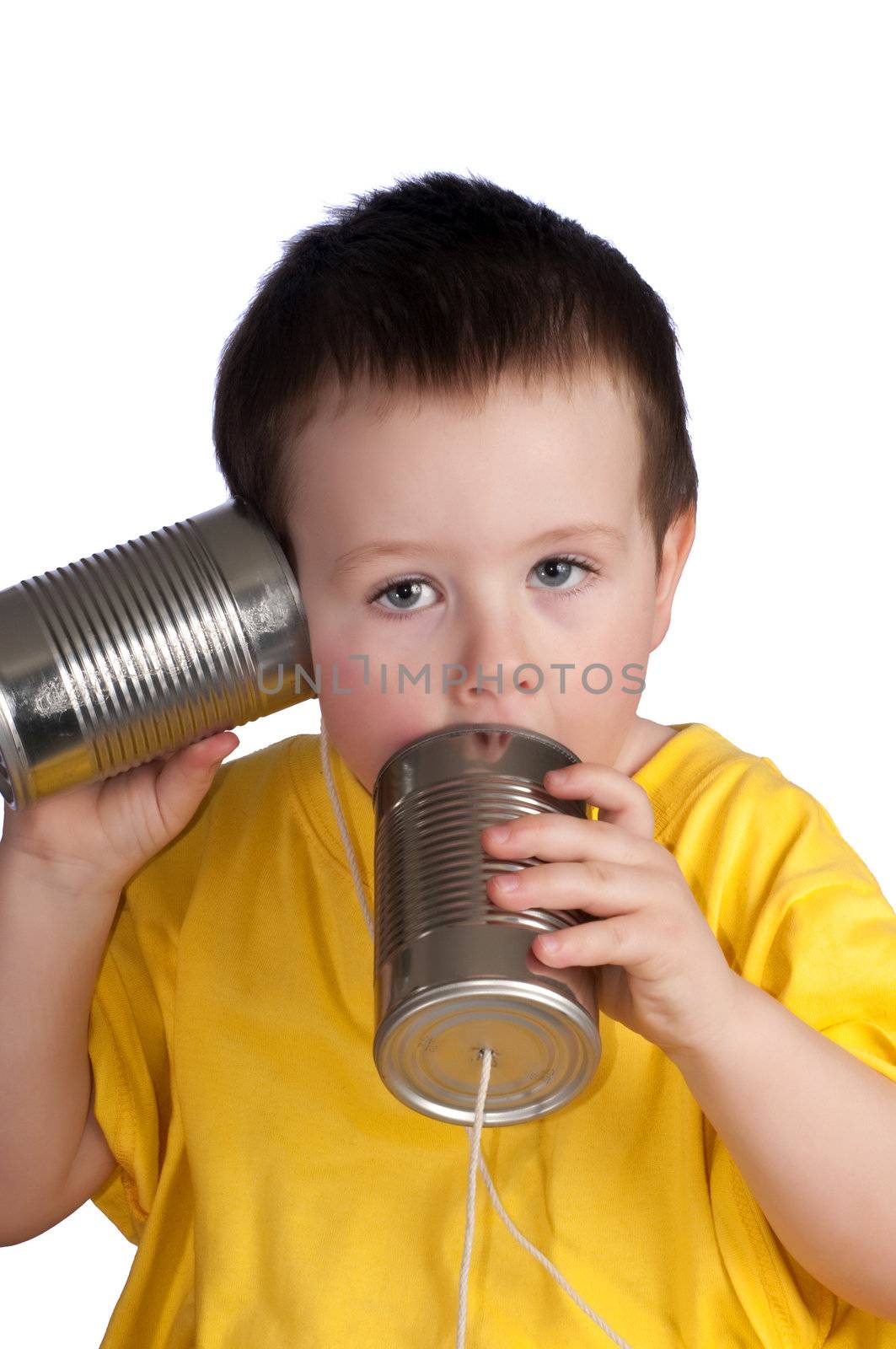 Baby boy playing with string walkie-talkie, made from tin cans and string.