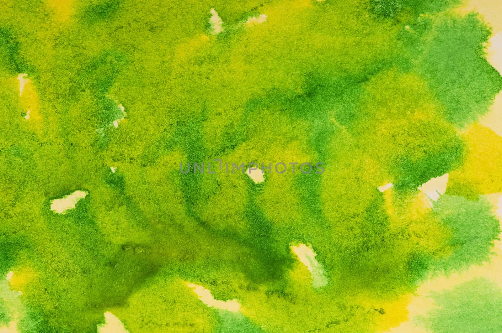 Closeup of a green and yellow watercolor wash