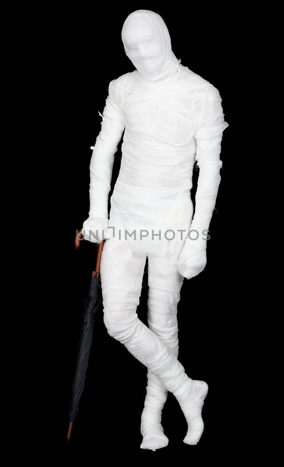 Man in costume mummy and umbrella by pzaxe