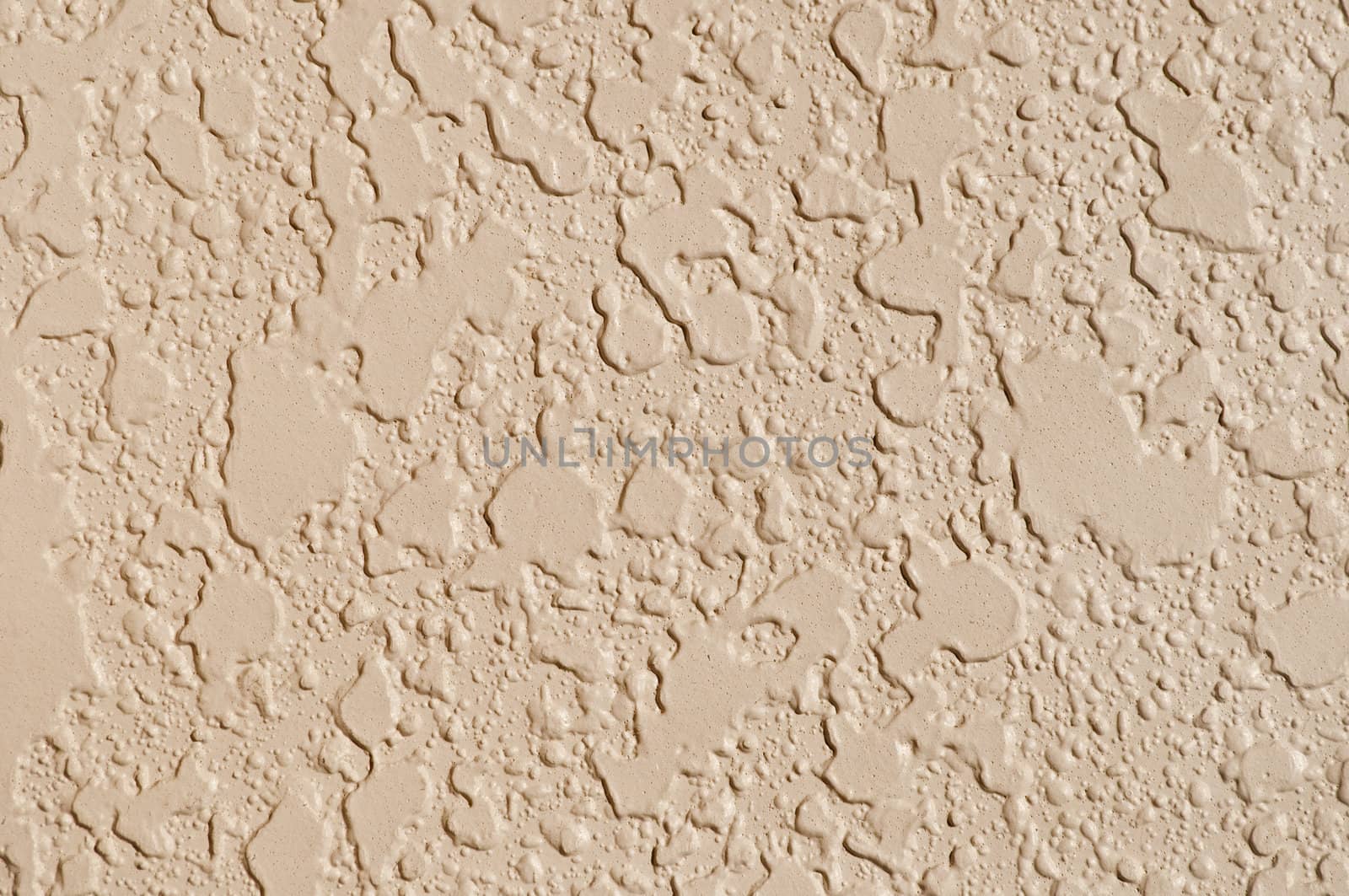 Textured wall with an earthtone color paint 