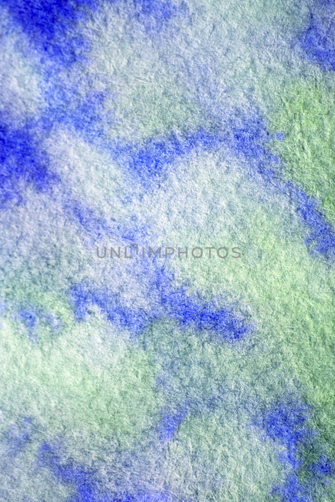 Green and blue paint on watercolor paper with texture for backgrounds.