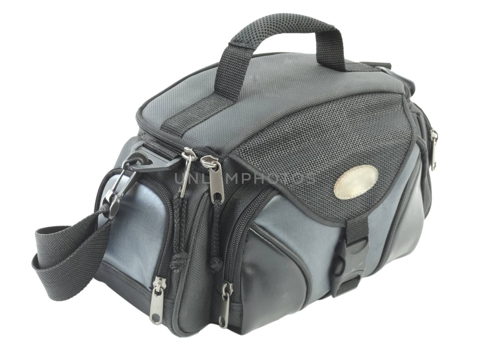 Blue nylon bag designed for carrying photographic equipment. Isolated on white background
