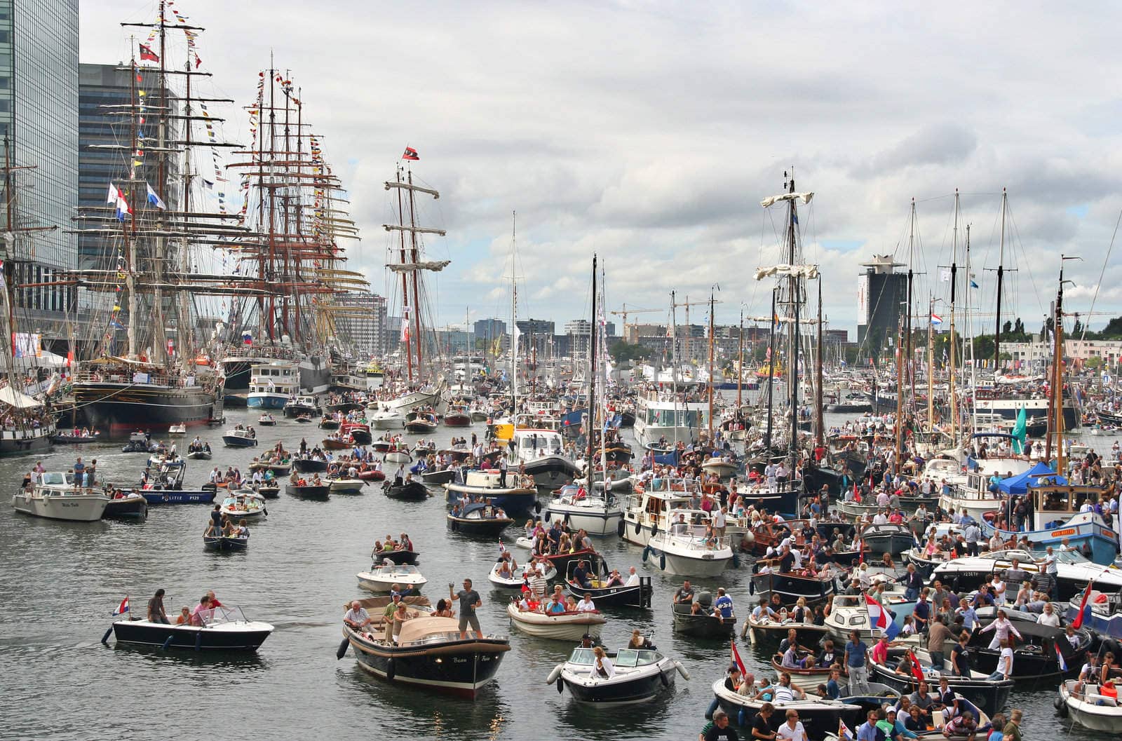 AMSTERDAM, AUGUST 19, 2010: Parade of little boats at Sail 2010 in Amsterdam, Holland on august 19, 2010