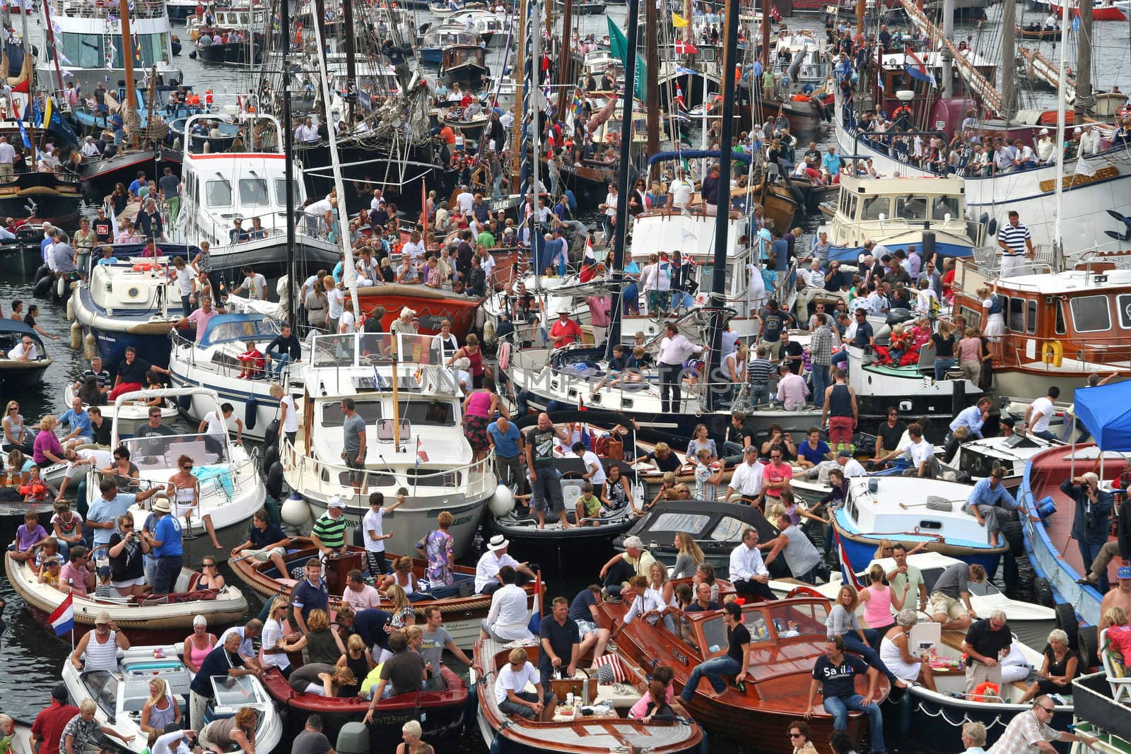 AMSTERDAM, AUGUST 19, 2010: Parade of little boats at Sail 2010 in Amsterdam, Holland on august 19, 2010