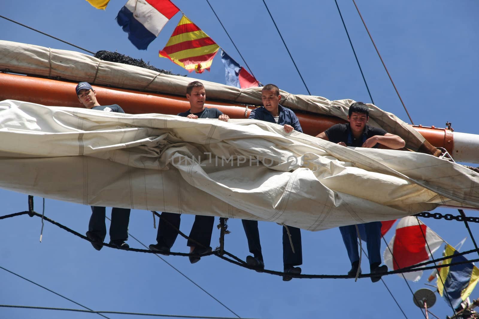 AMSTERDAM, AUGUST 19, 2010: Sailers of Russian tall ship Sedov at Sail 2010 in Amsterdam, Holland on august 19, 2010