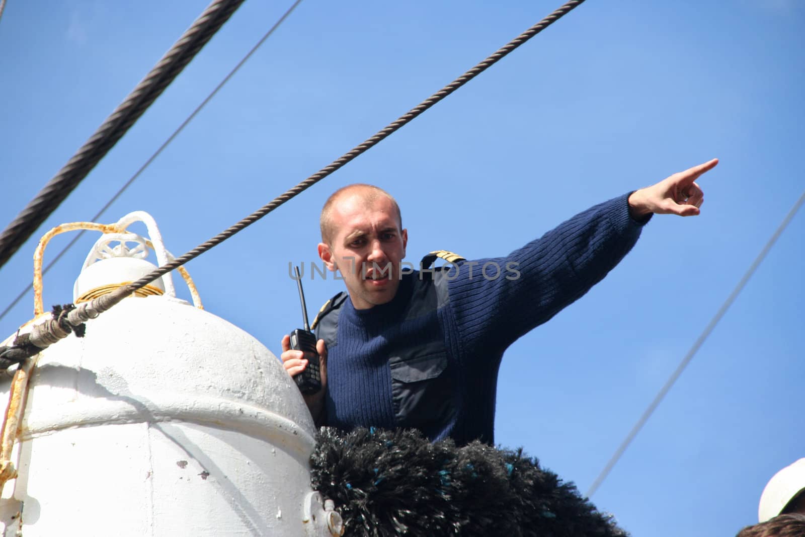 AMSTERDAM, AUGUST 19, 2010: Mate overseeing the mooring of the Russian tall ship Sedov to the quay at Sail 2010 in Amsterdam, Holland on august 19, 2010