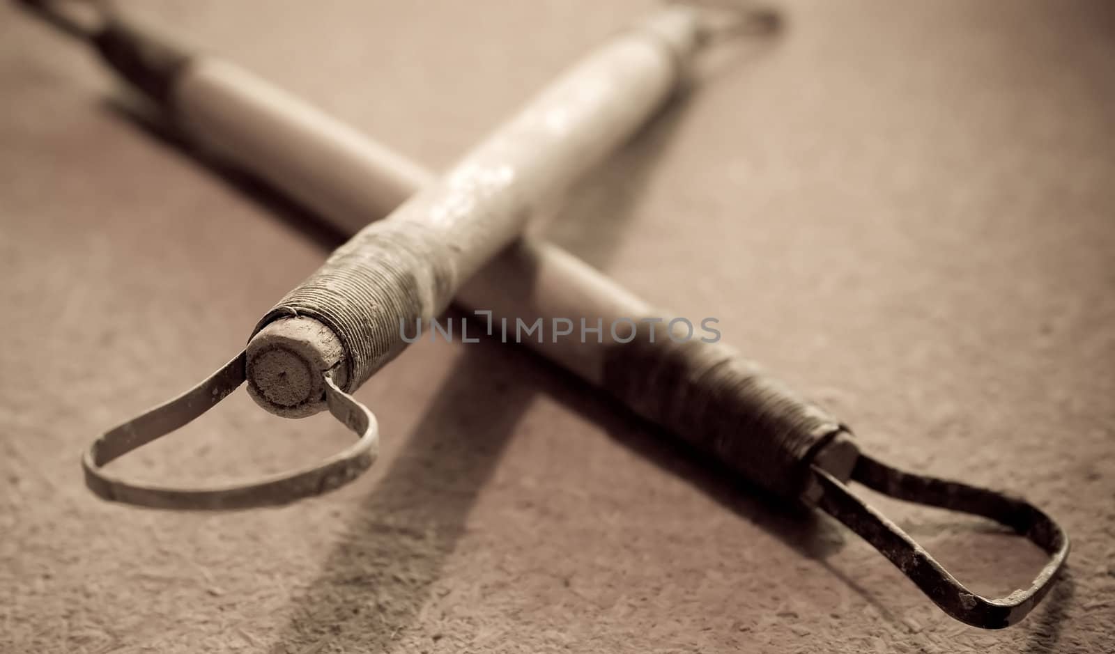 Closeup photo shot of tools commonly used for pottery. Artistic and old tools.