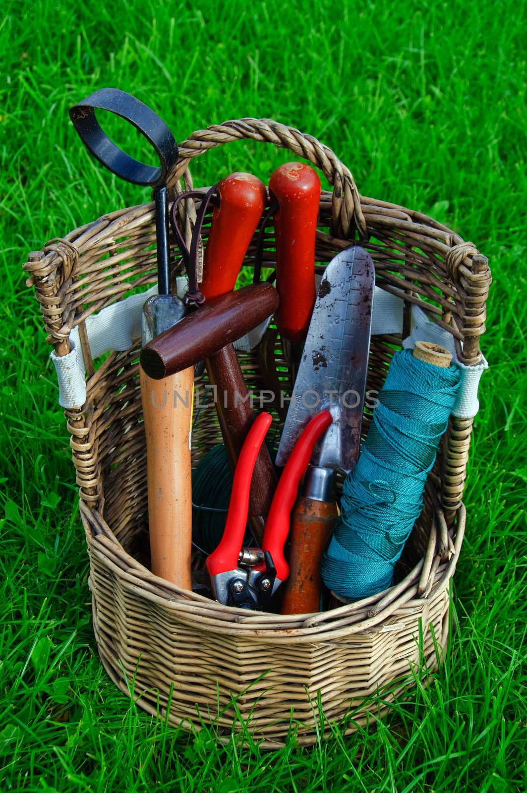 A basket with garden tools