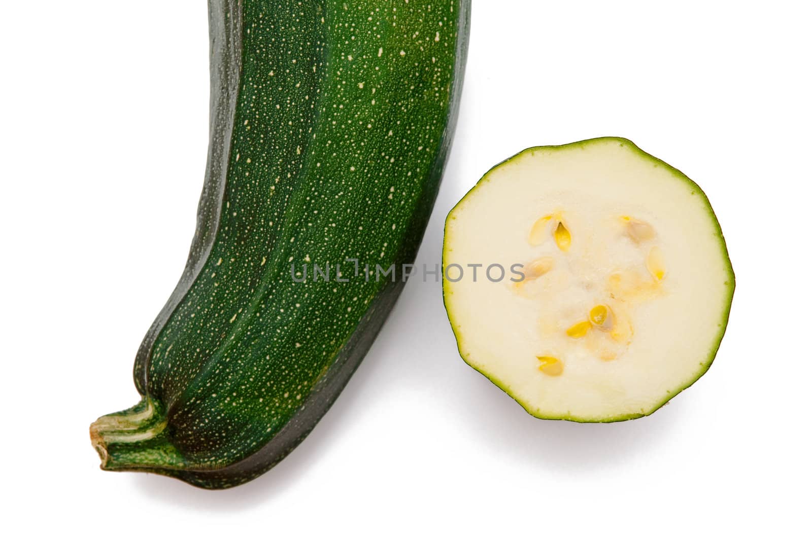 A courgette isolated on white
