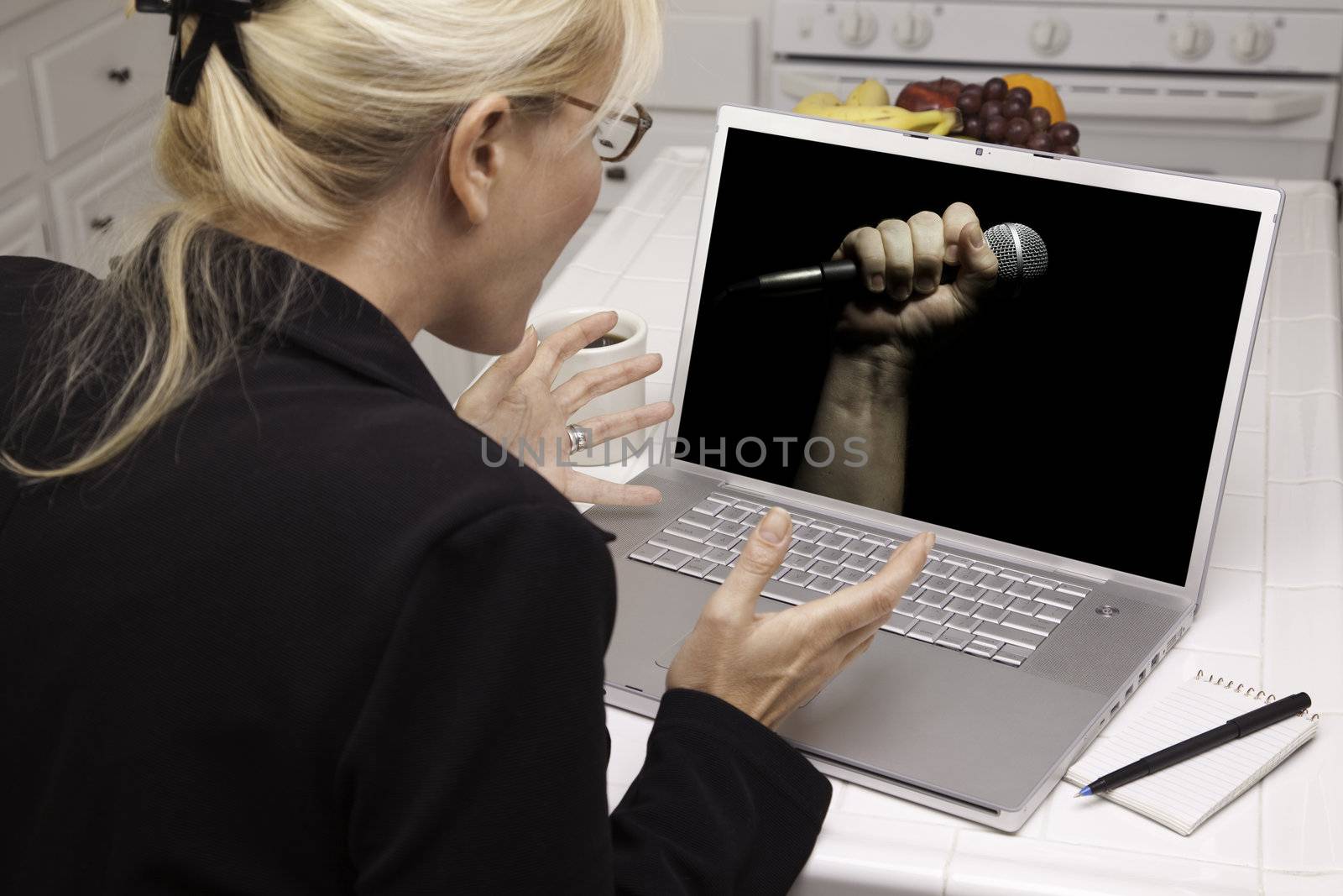 Excited Woman In Kitchen Using Laptop - Freedom of Speech by Feverpitched