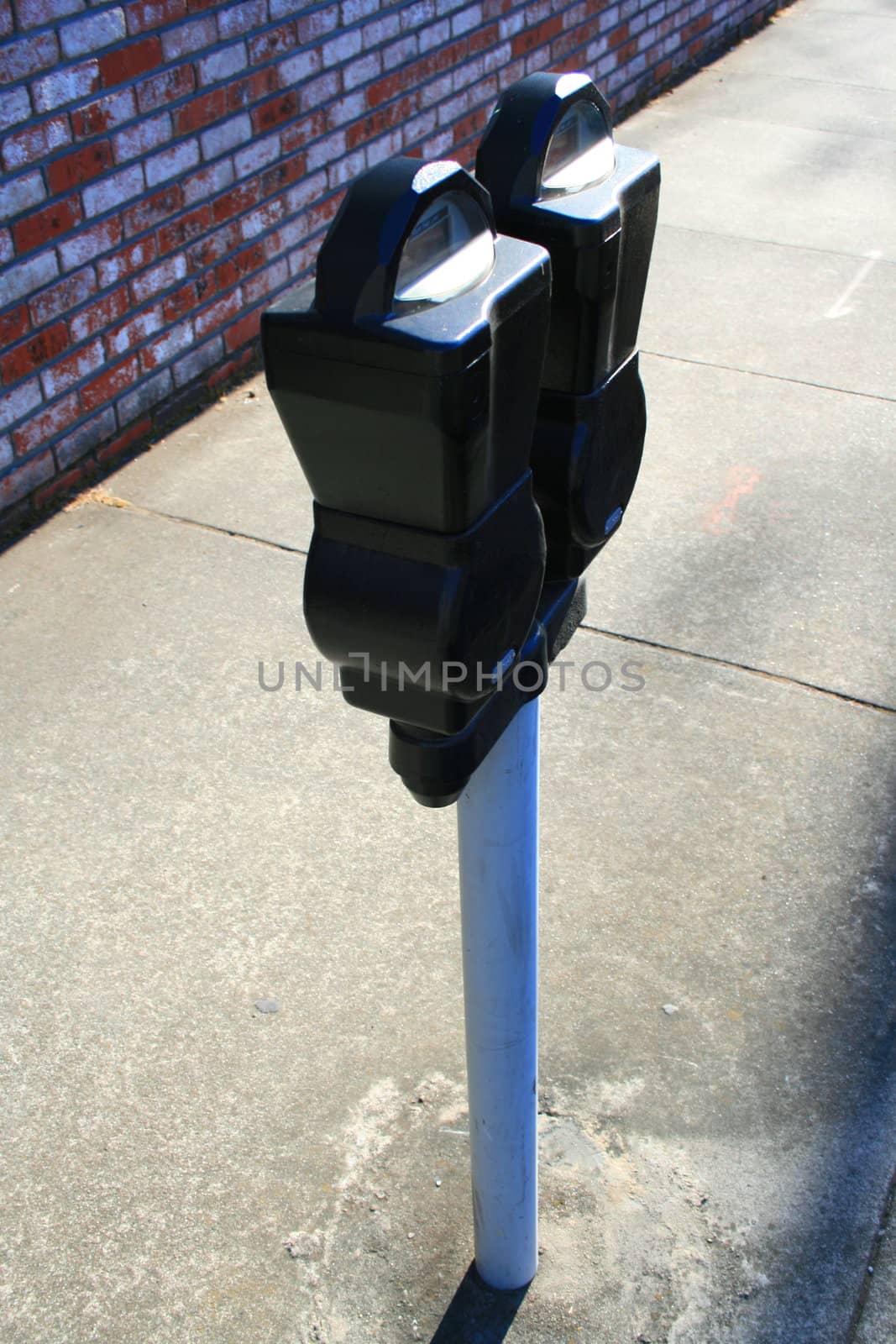 Close up of the parking meters.
