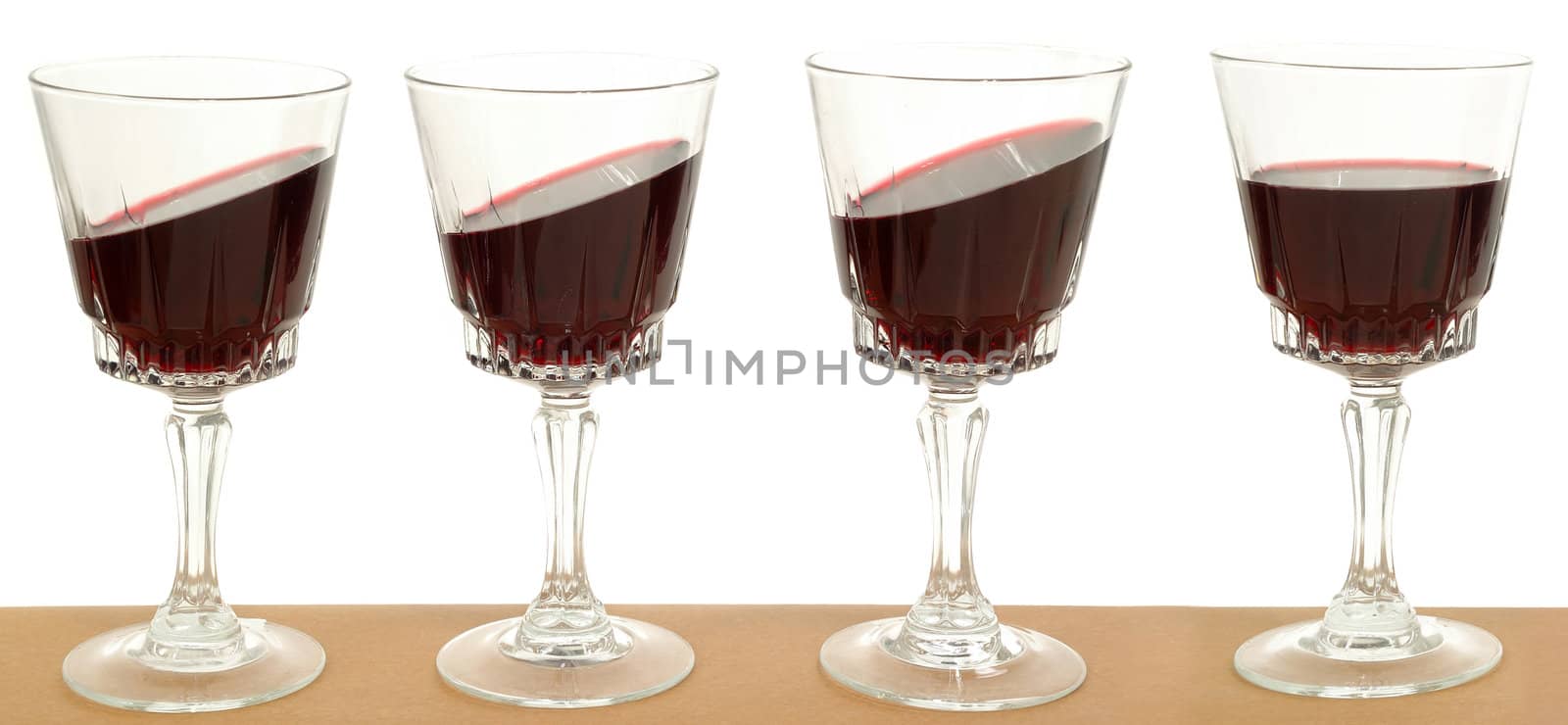 Line of wineglasses by cfoto