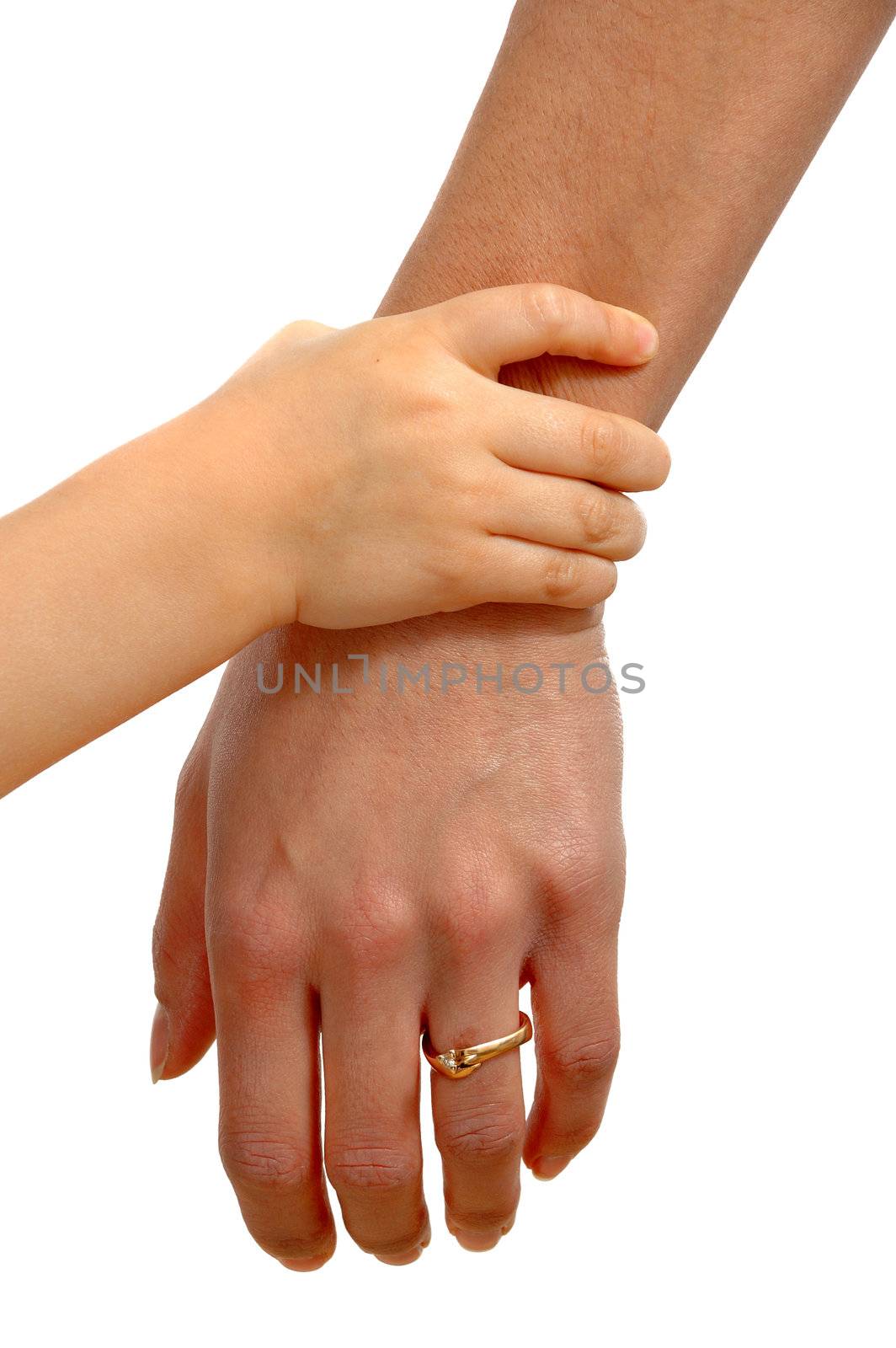 Young hand is holding around mothers wrist.
