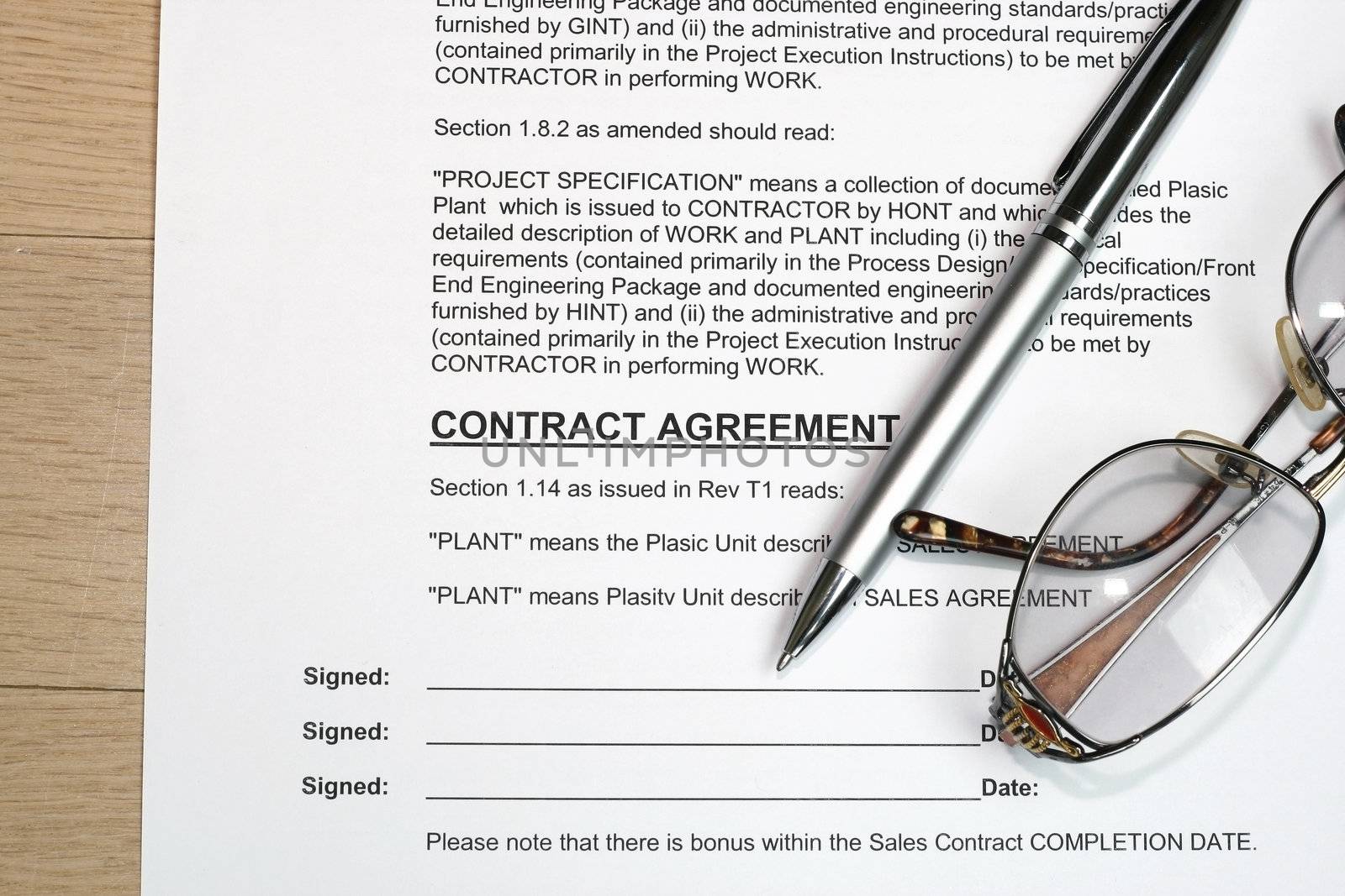 Contract signing concept. Note: data is all fiction.