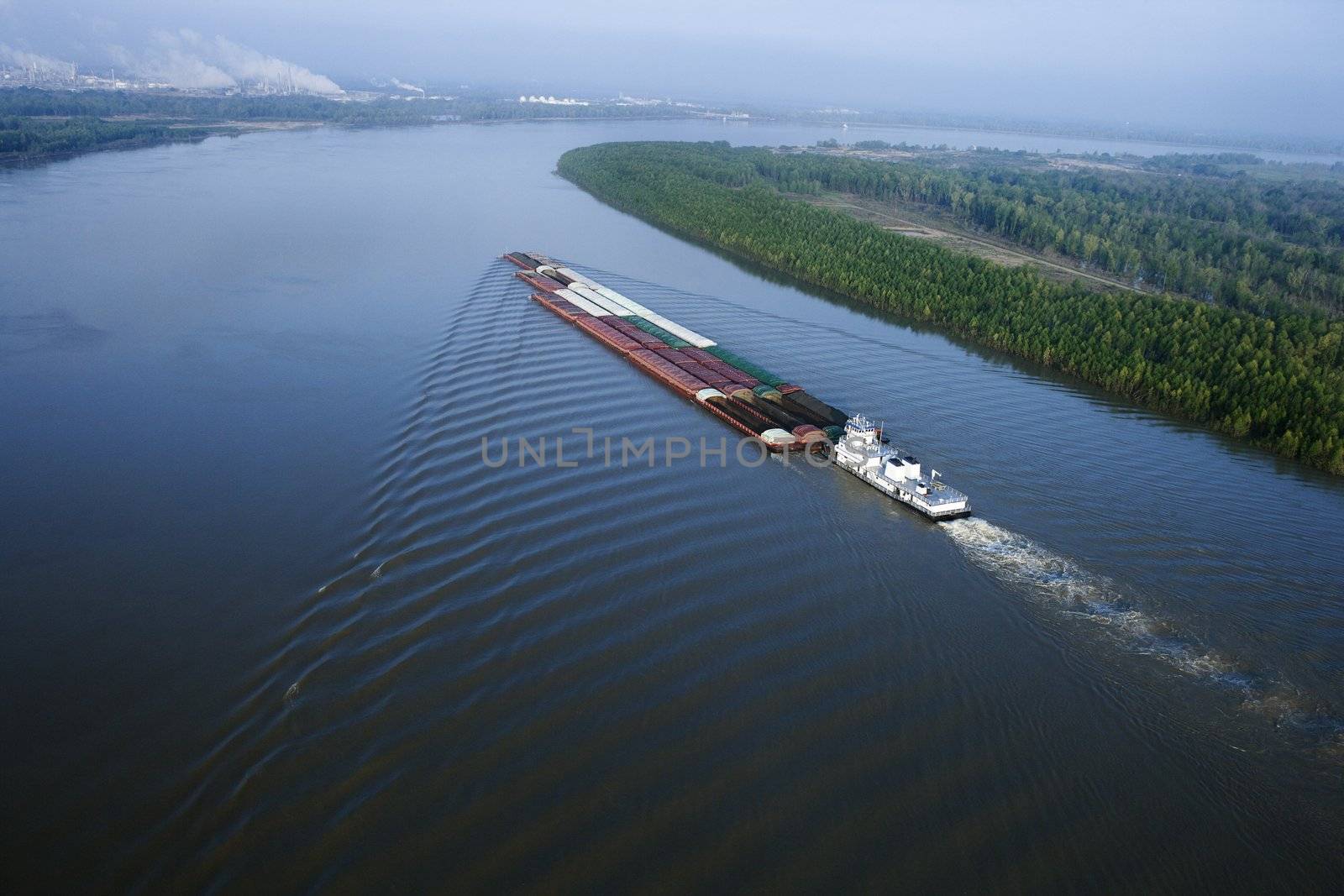 Barge on Mississippi. by iofoto