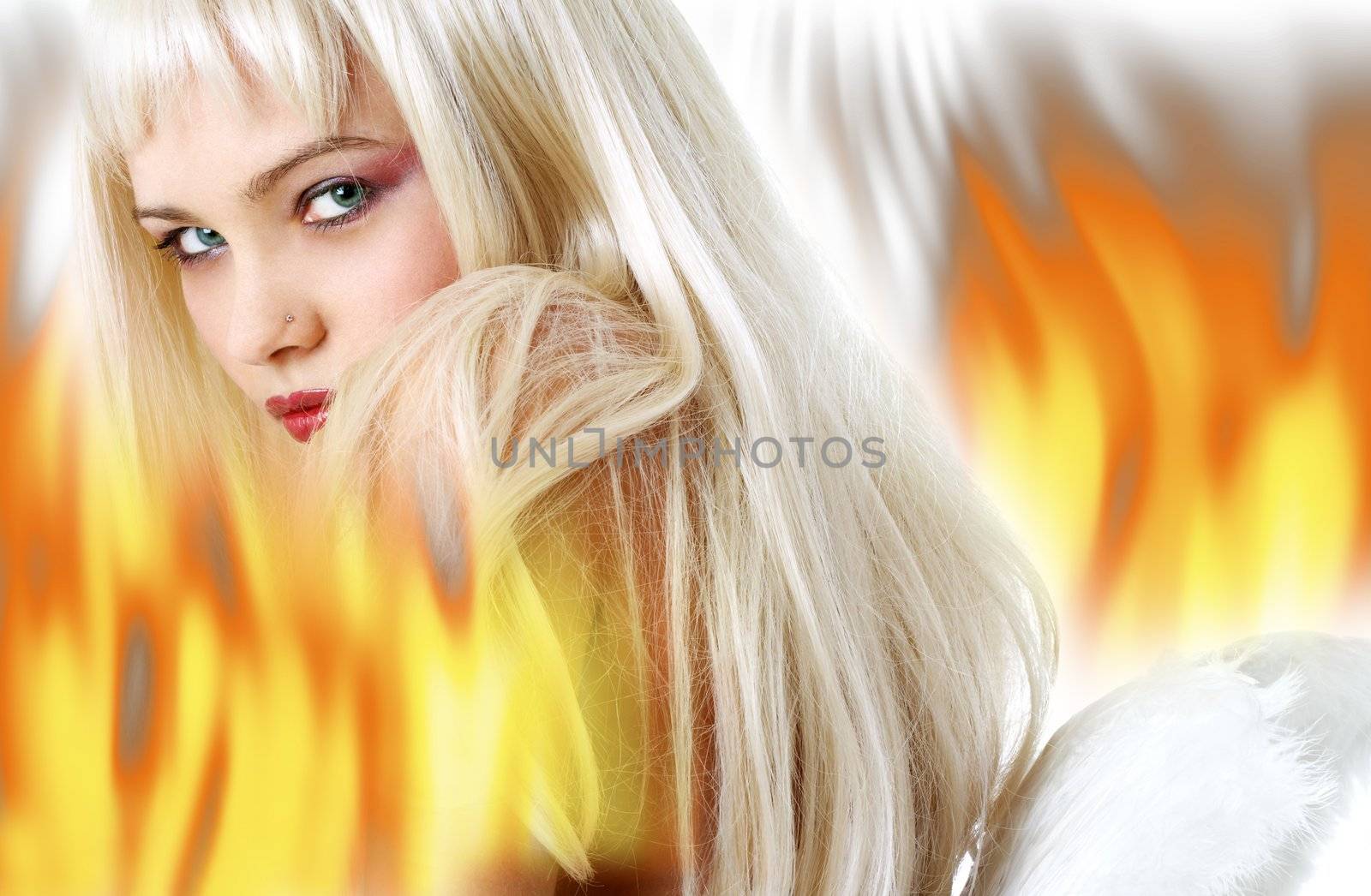 lovely blond with angel wings surrounded by fire