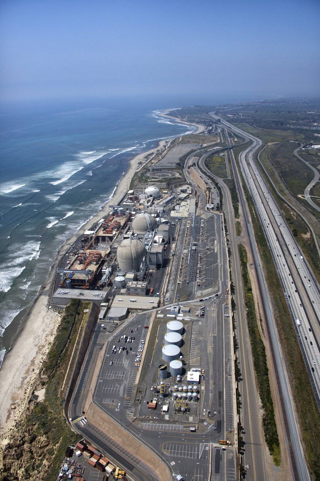 Aerial of nuclear power plant on California coast, USA.