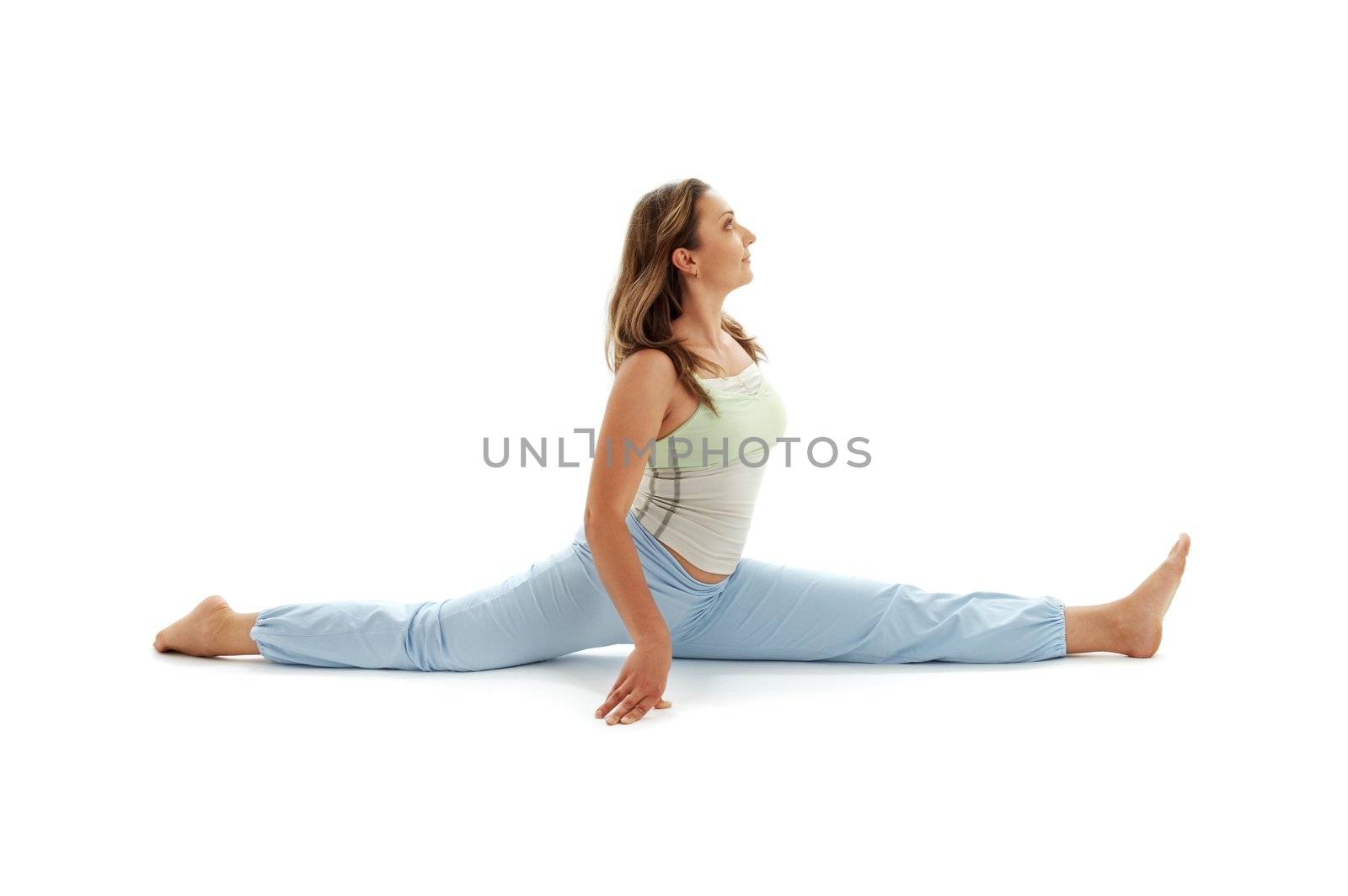 sporty girl practicing hanumanasana monkey pose over white