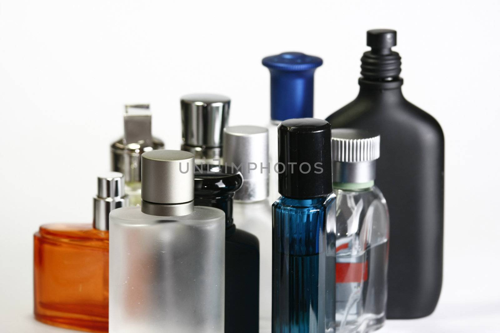 Perfume and fragrances bottles in a white background.