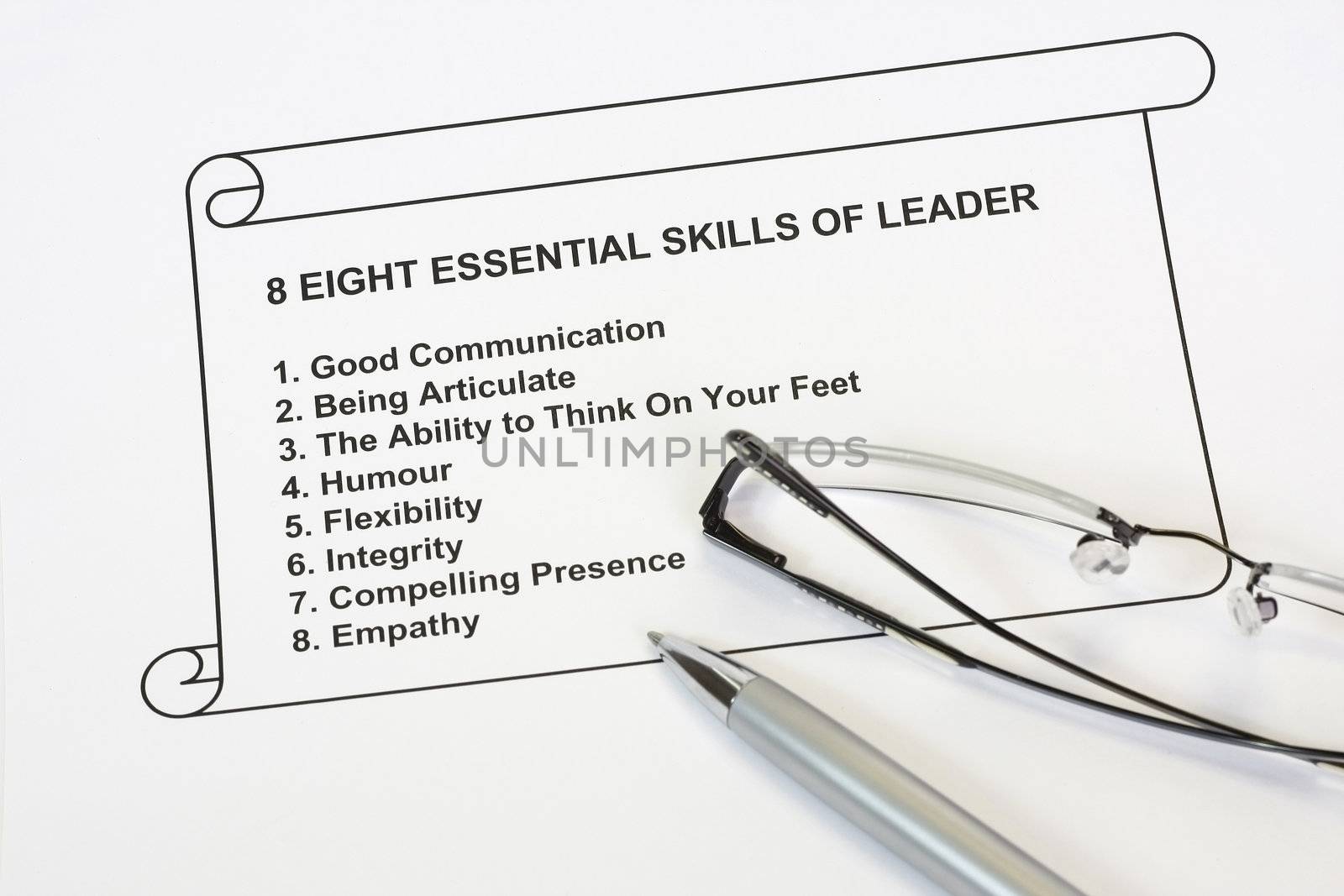 eight essential skills of leader concept with pen and eyeglass in whte background