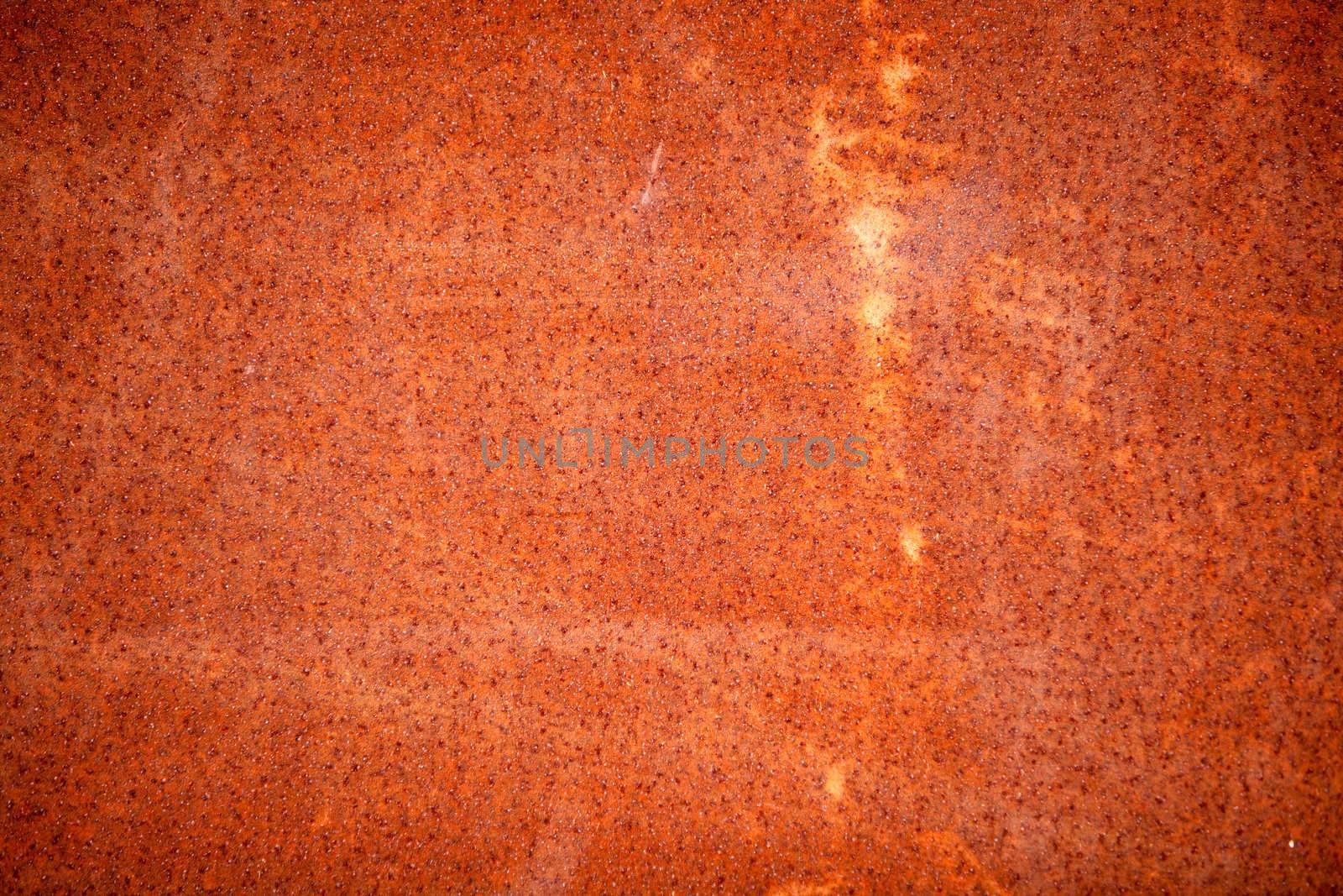 A rust background texture surface - red / brown