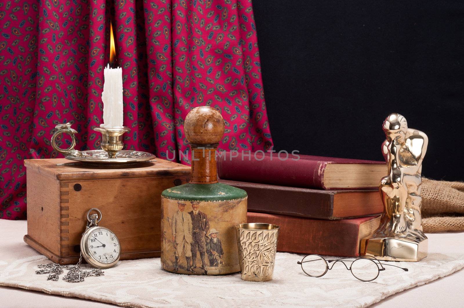 Vintage still life with antique spectacles and pocket watch