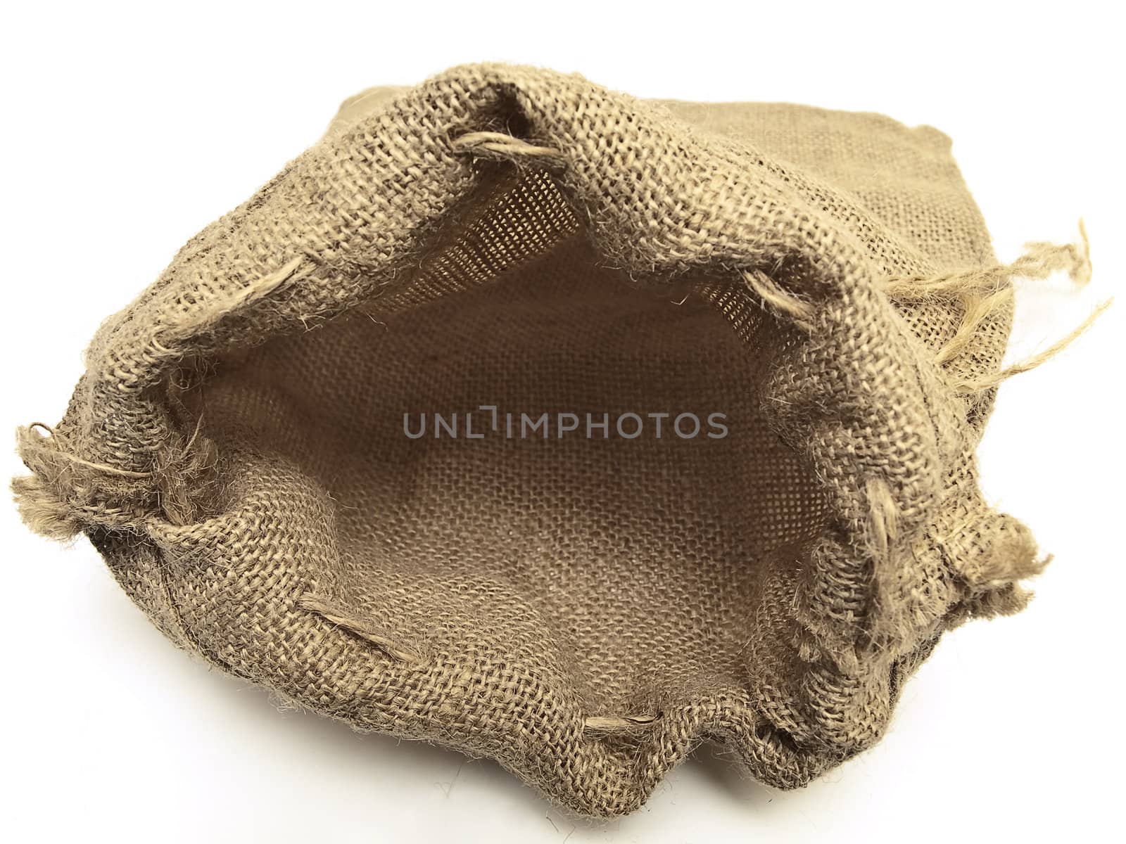 open beige linen sack with the braids against the white background