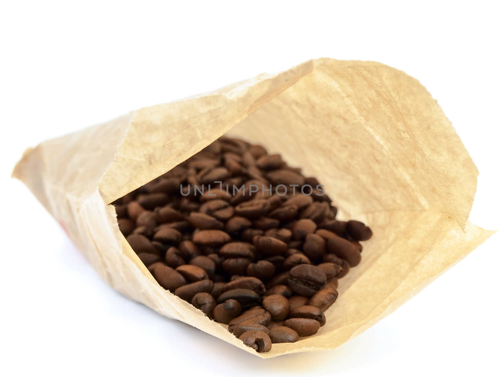 paper sack with coffee beans over the white background