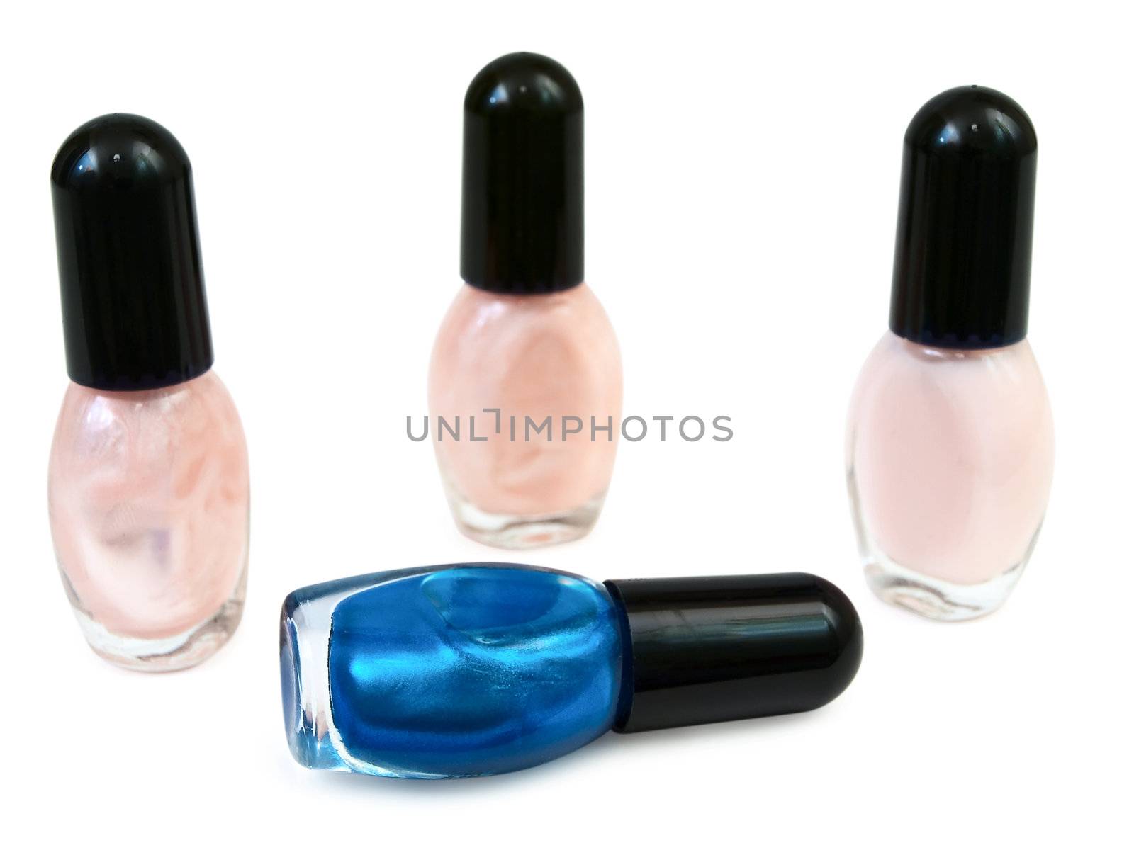 bottles with nail polish over the white background 