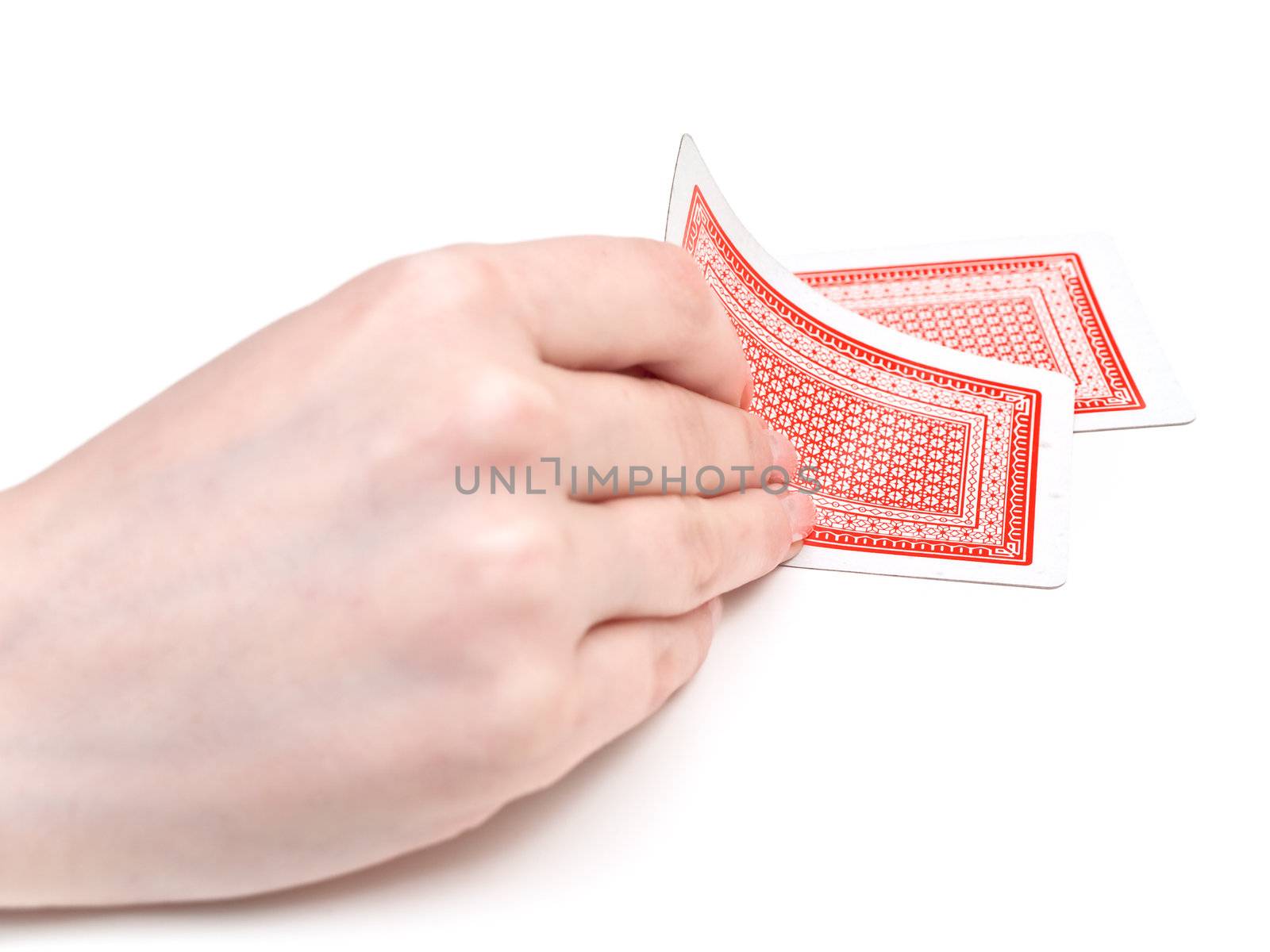 playing cards in the woman hand against the white background