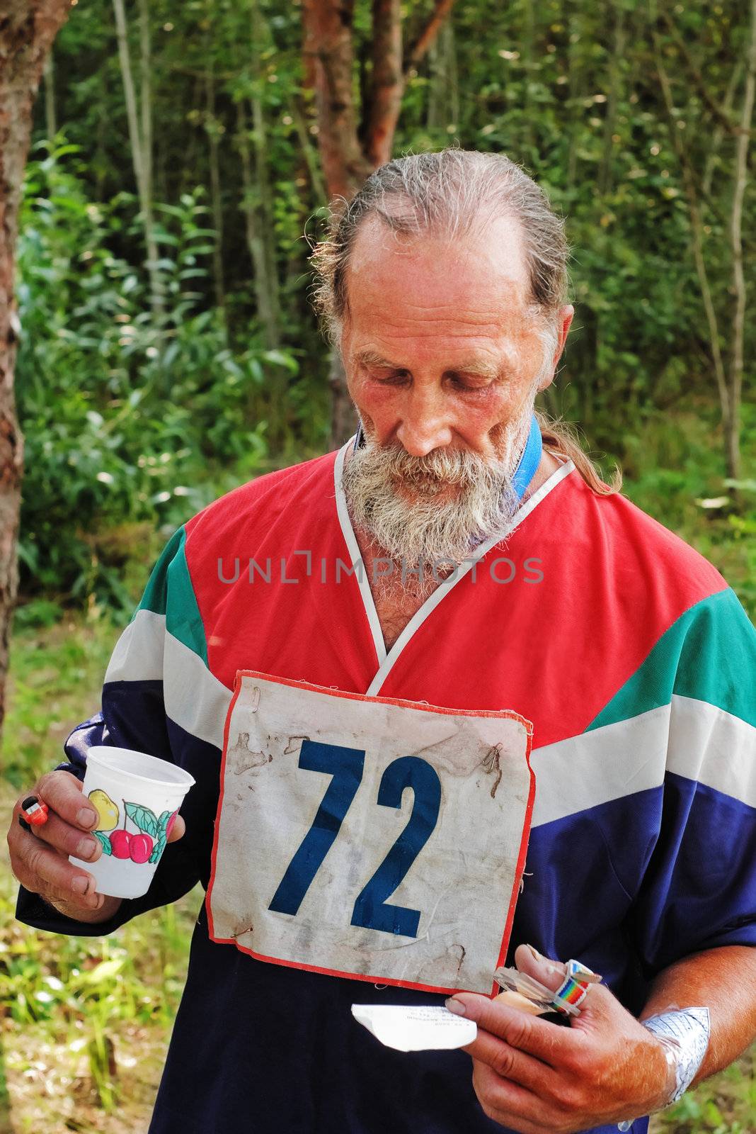 The sportsman after finish considers result listing of  the running