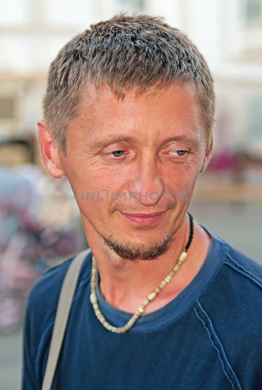 Easy smile on the face of the young man