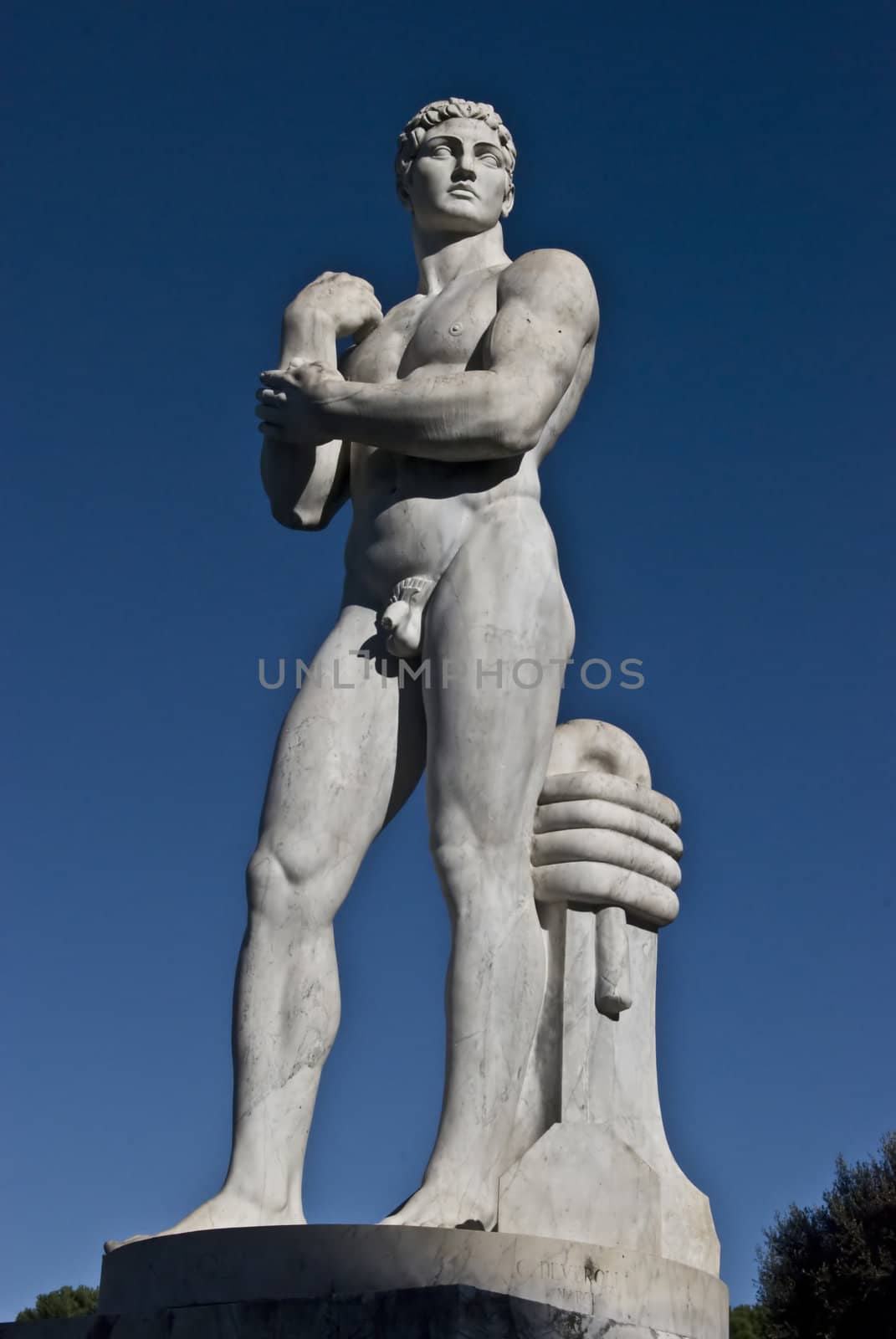 statue of an athlete on a sunny day