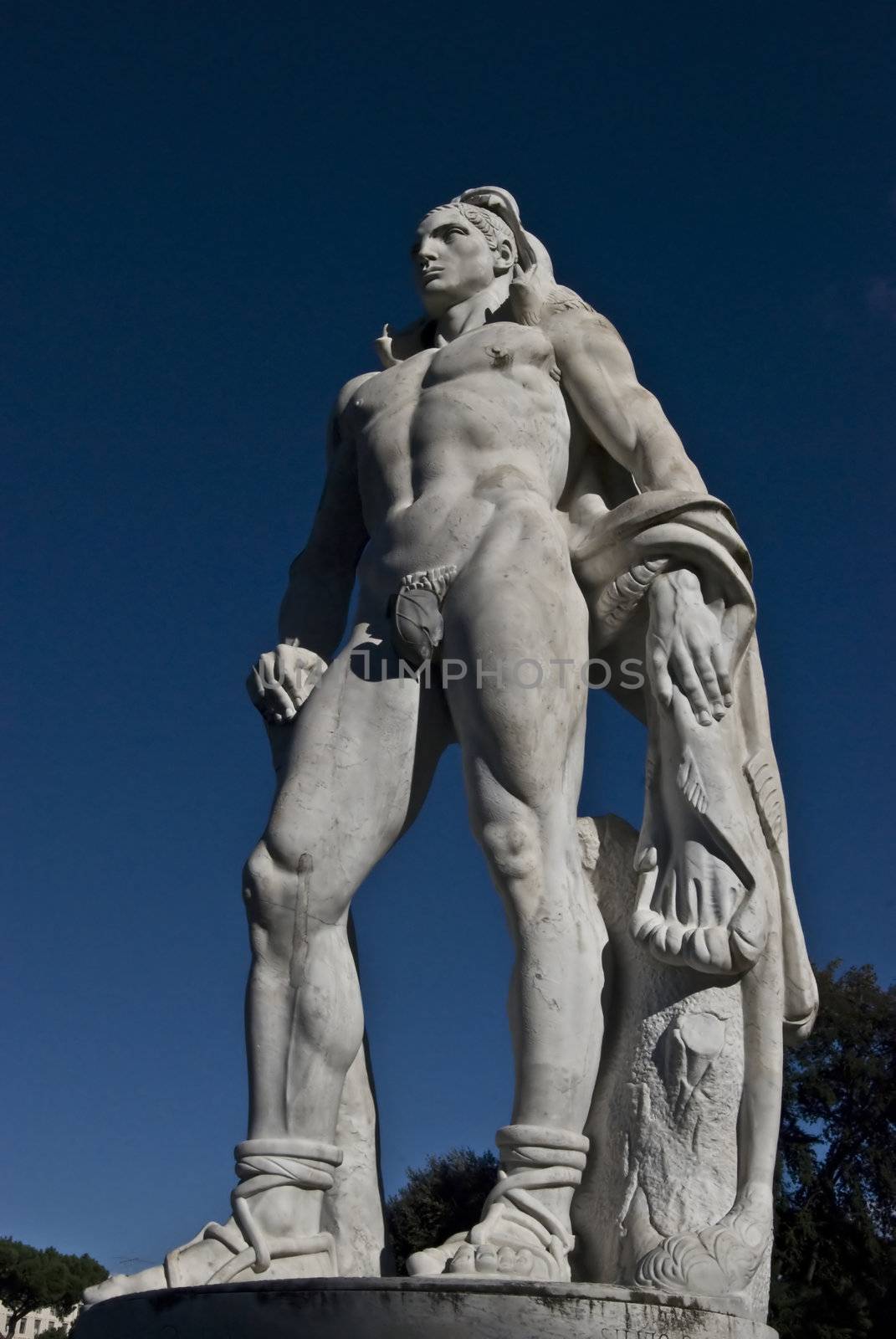 statue of an athlete on a sunny day