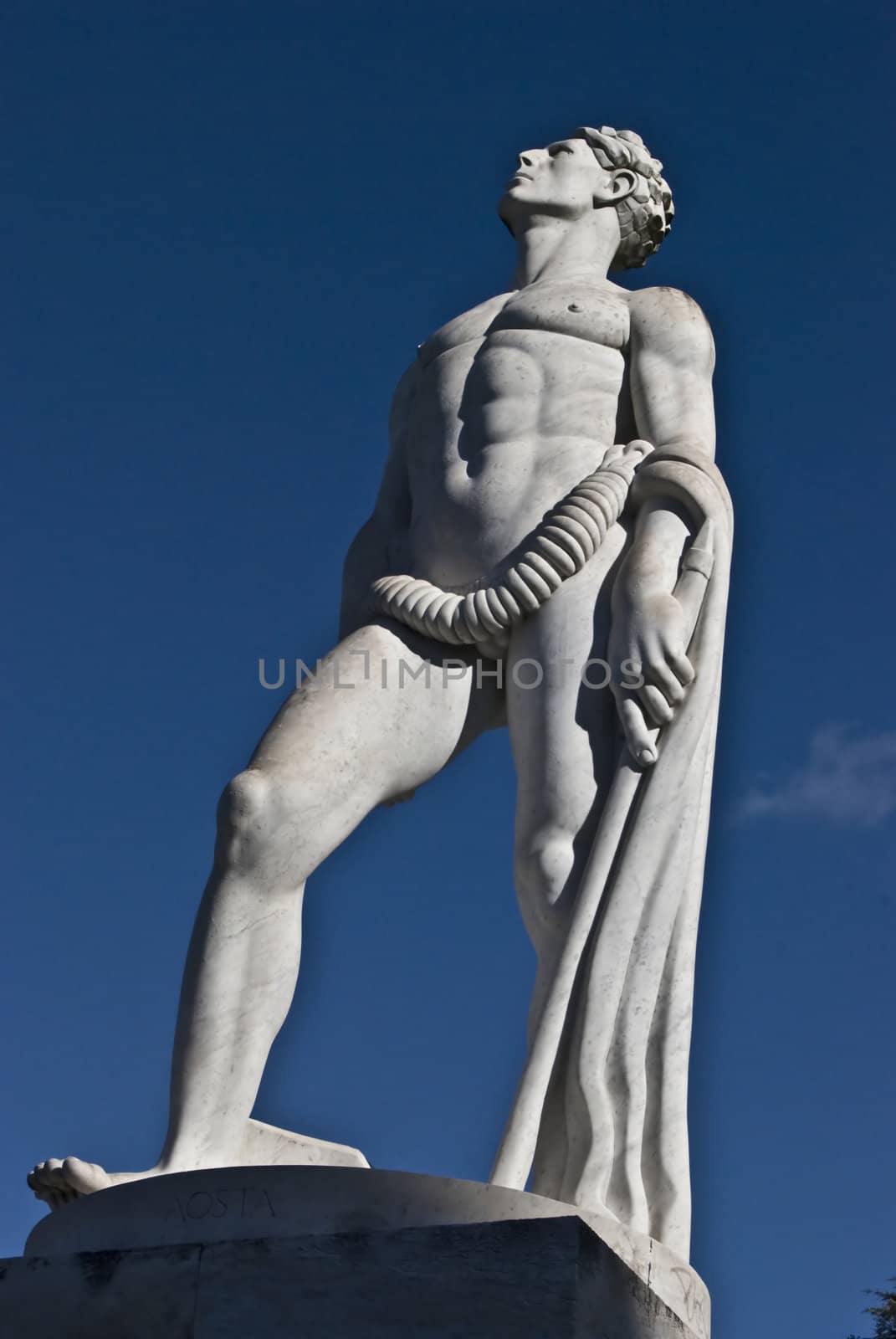 statue of an athlete on a sunny day