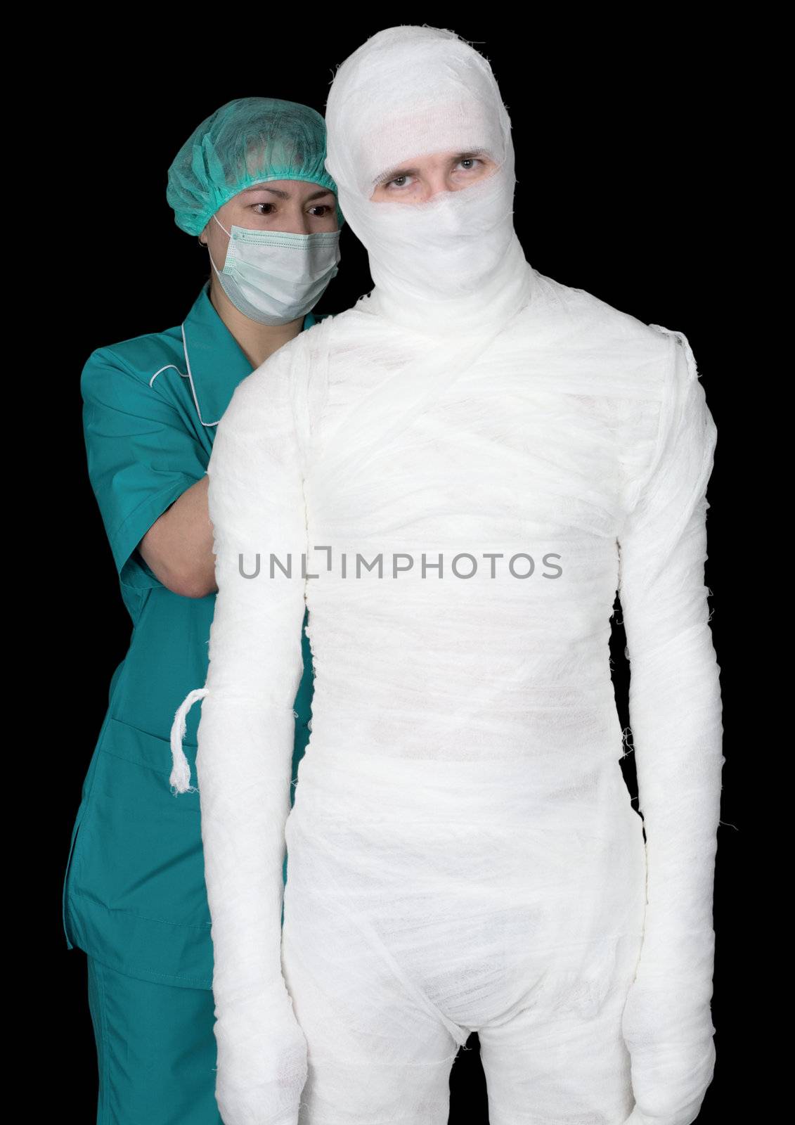 Man in bandage and nurse on black background	