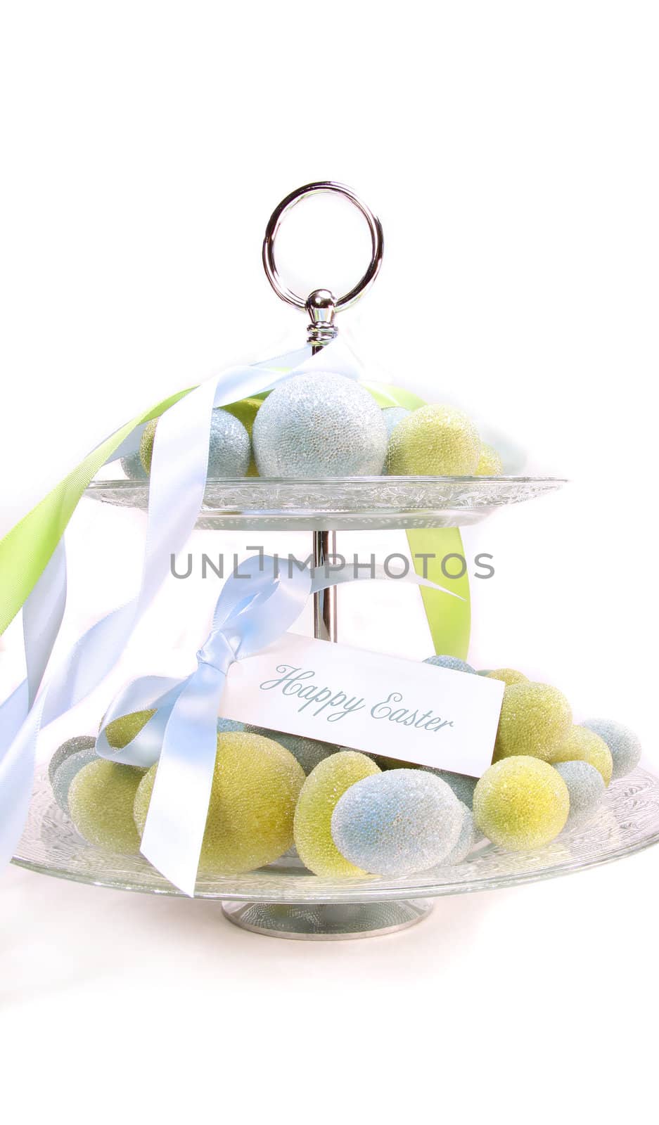 Colored beaded easter eggs on white background