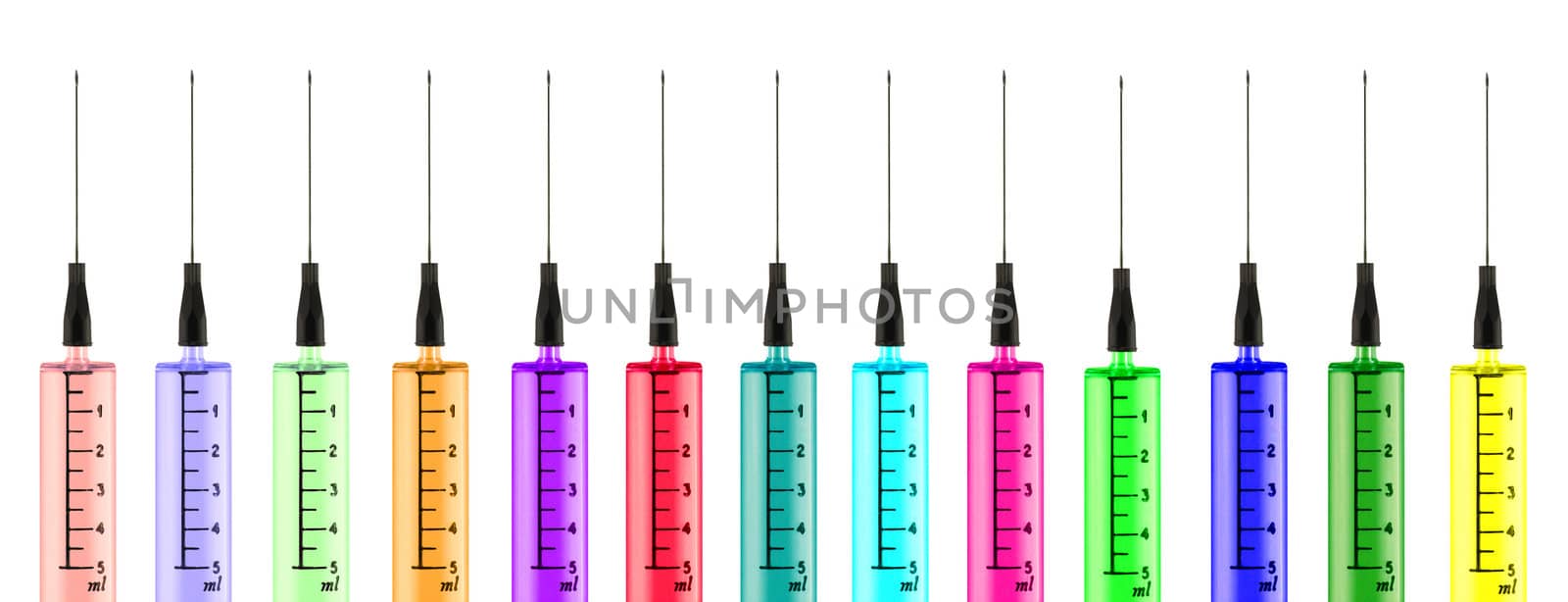 Colorful syringes isolated in white