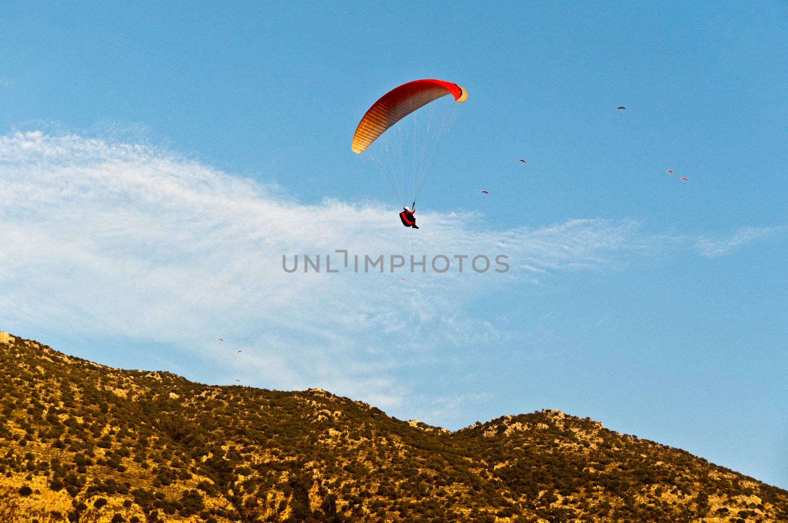 Numerous paragliders above Oludeniz, near Fethiye, Turkey, in great evening light
