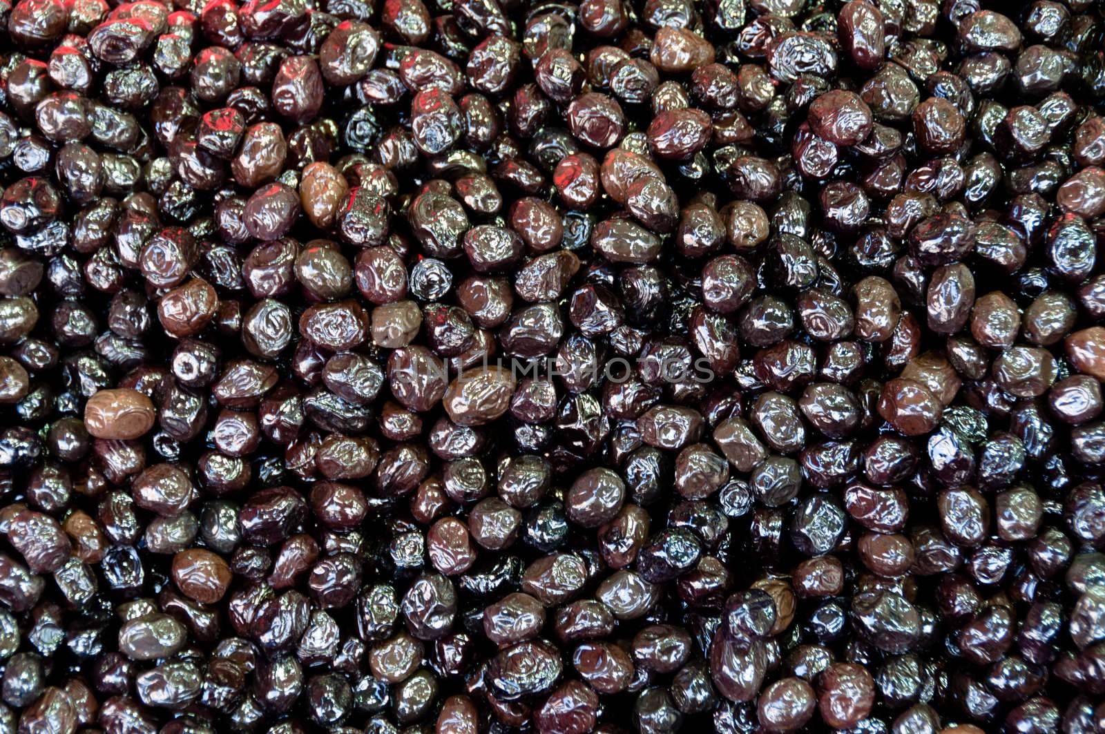 Large collection of black olives on sale at Egypt Bazaar (MisirCarsisi) in Istanbul, Turkey