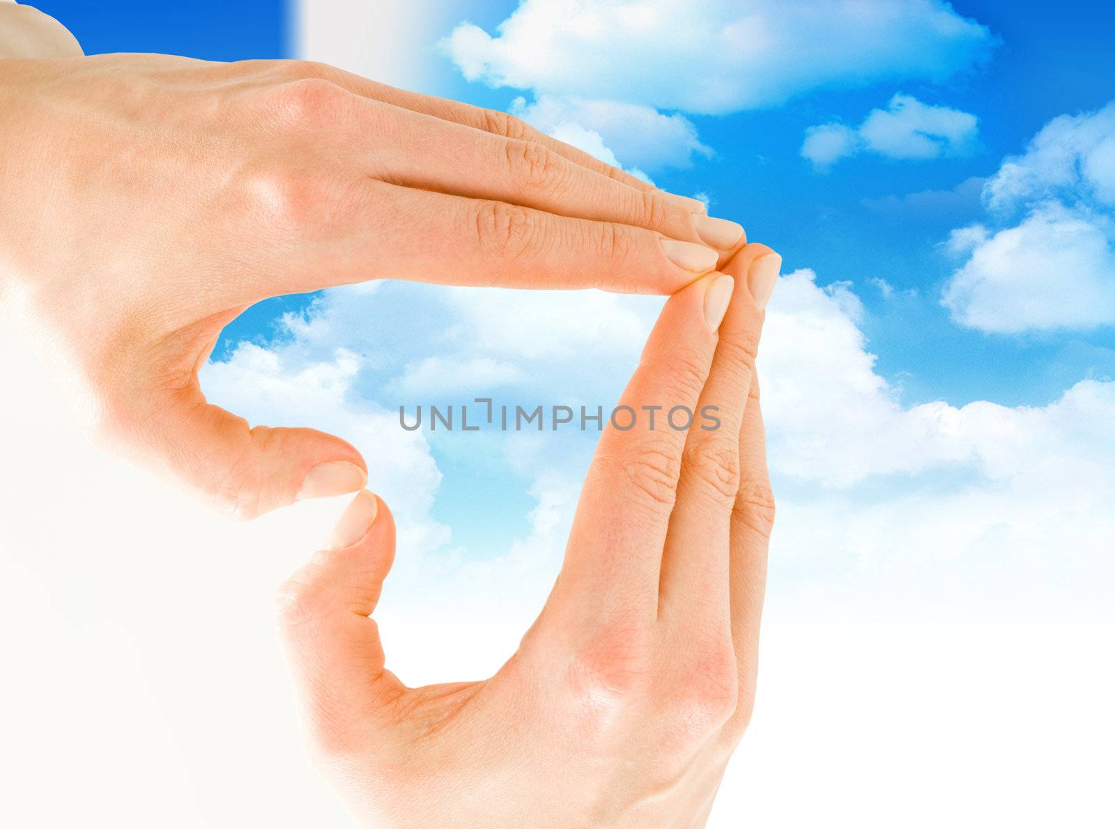 Nice background with hands like a heart and blue sky
