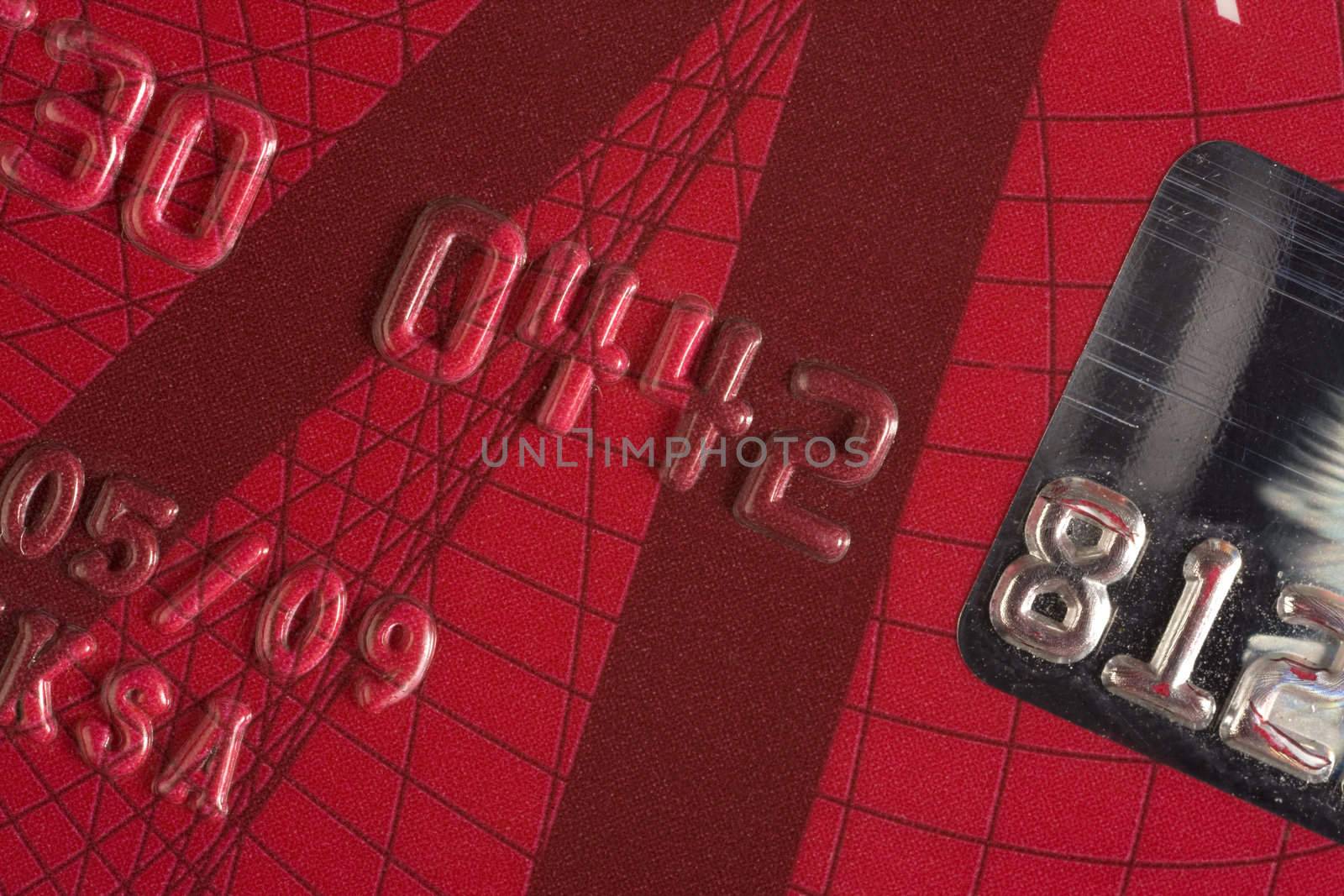 photo macro red credit card with number 