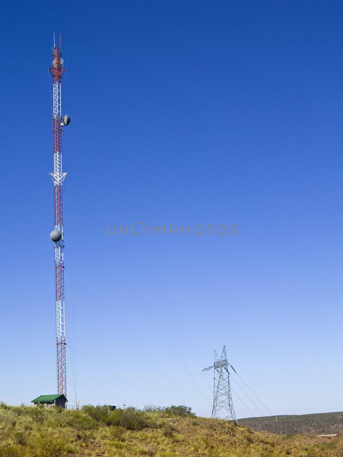 Cellular communication antenna on a blue sky background.